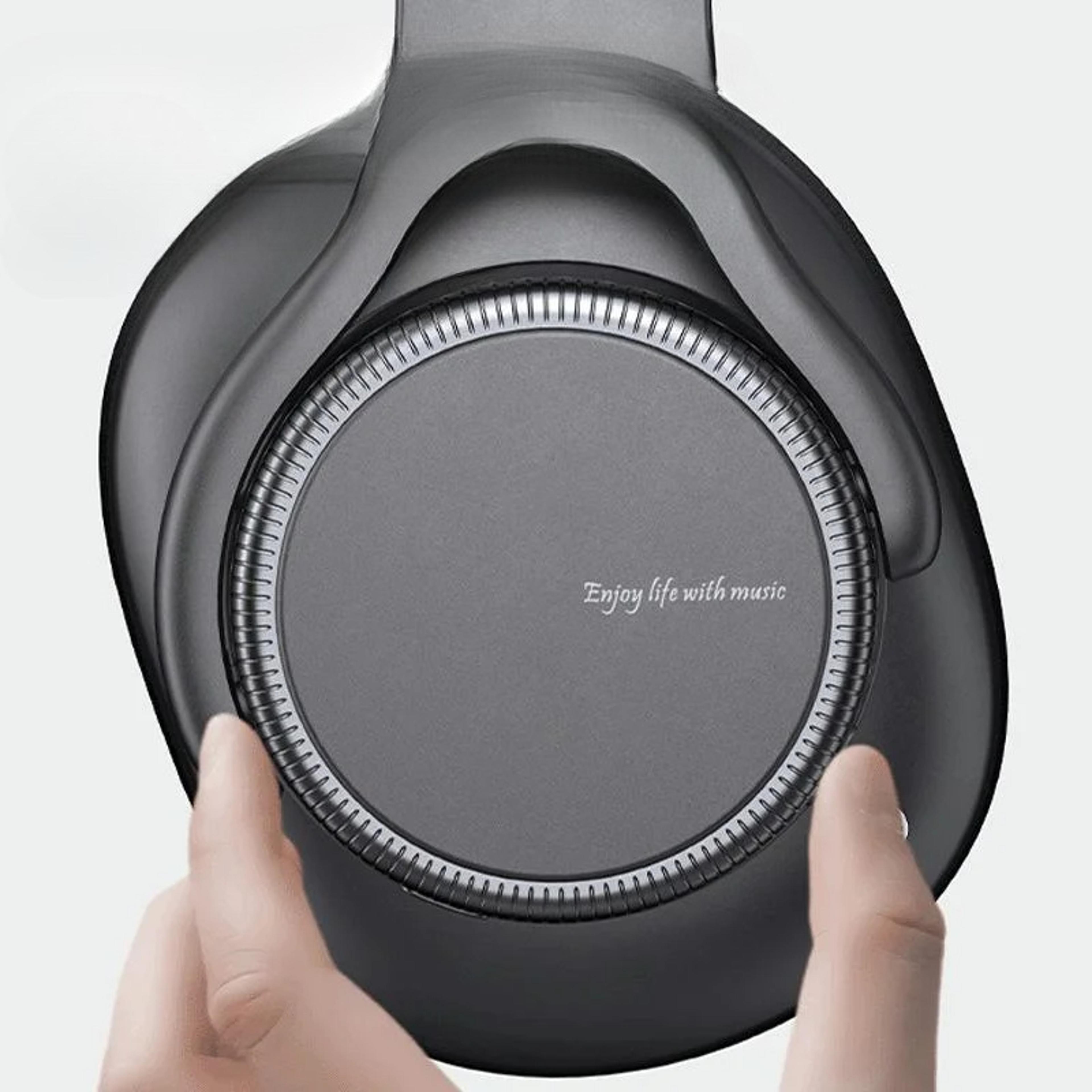 bluetooth wireless over ear headphones with rotary volume knob and foldable design
