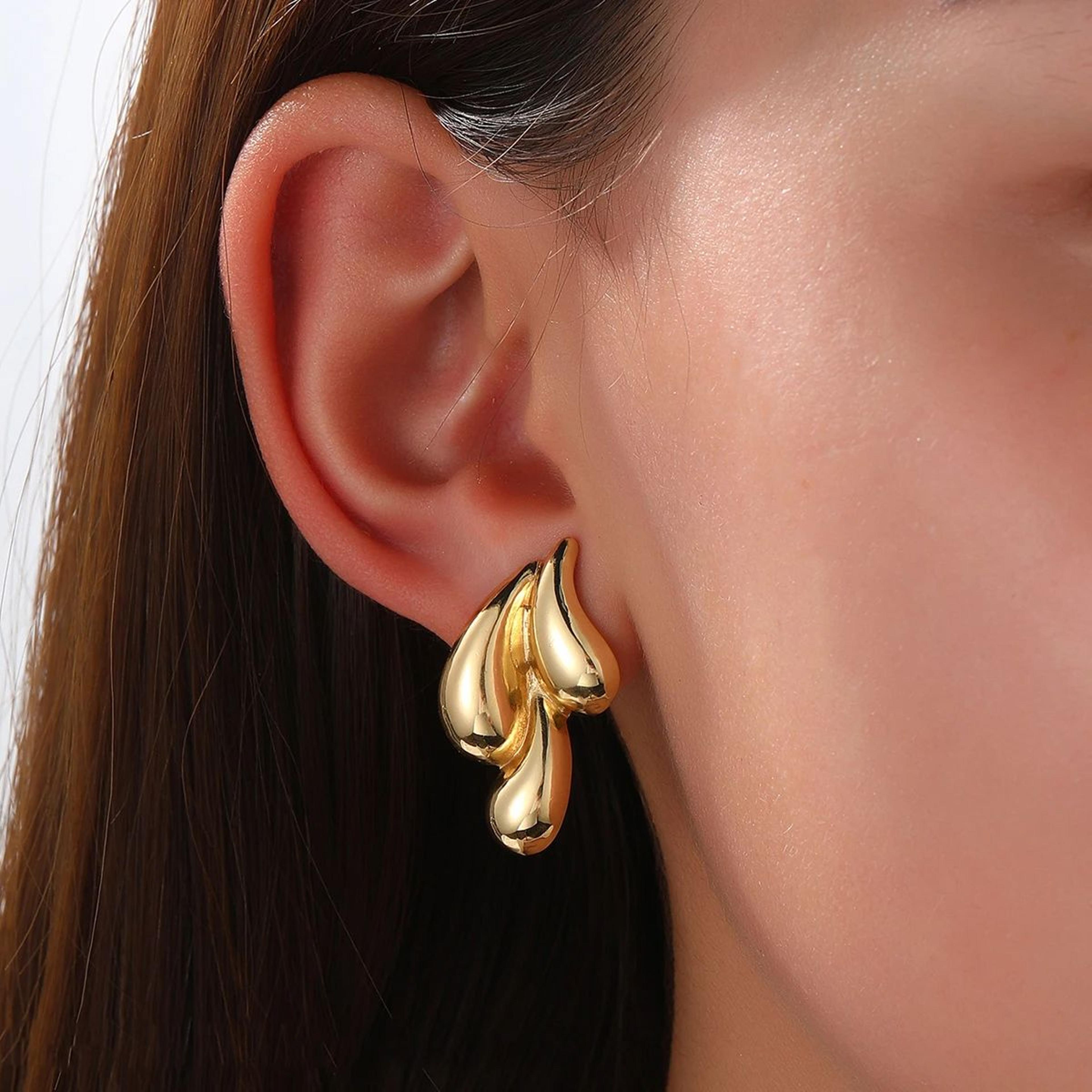 elegant teardrop stud earrings for women triple layer gold stud earrings & silver water drop design