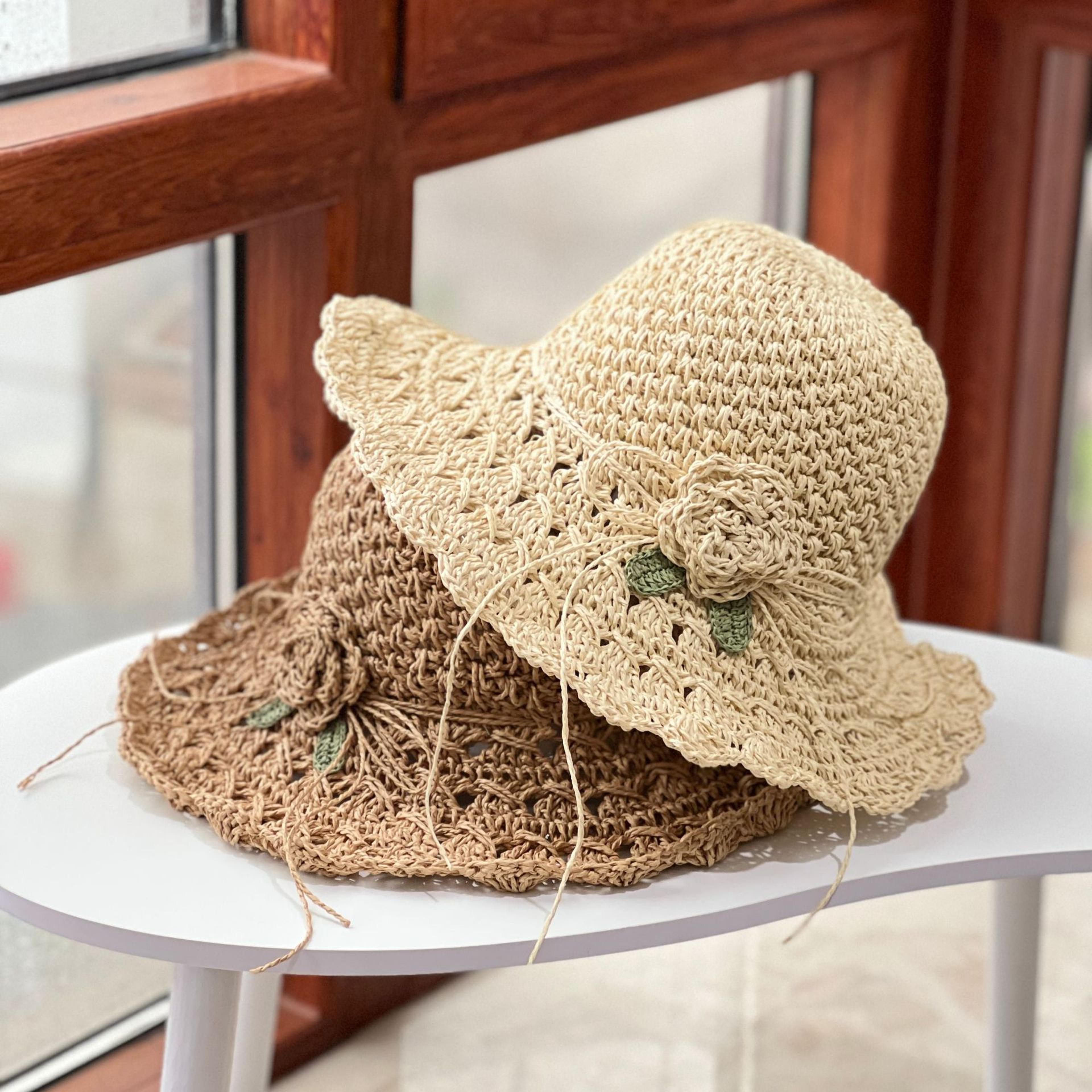 handwoven womens straw hat with floral accent wide brim beach sun hat for uv protection