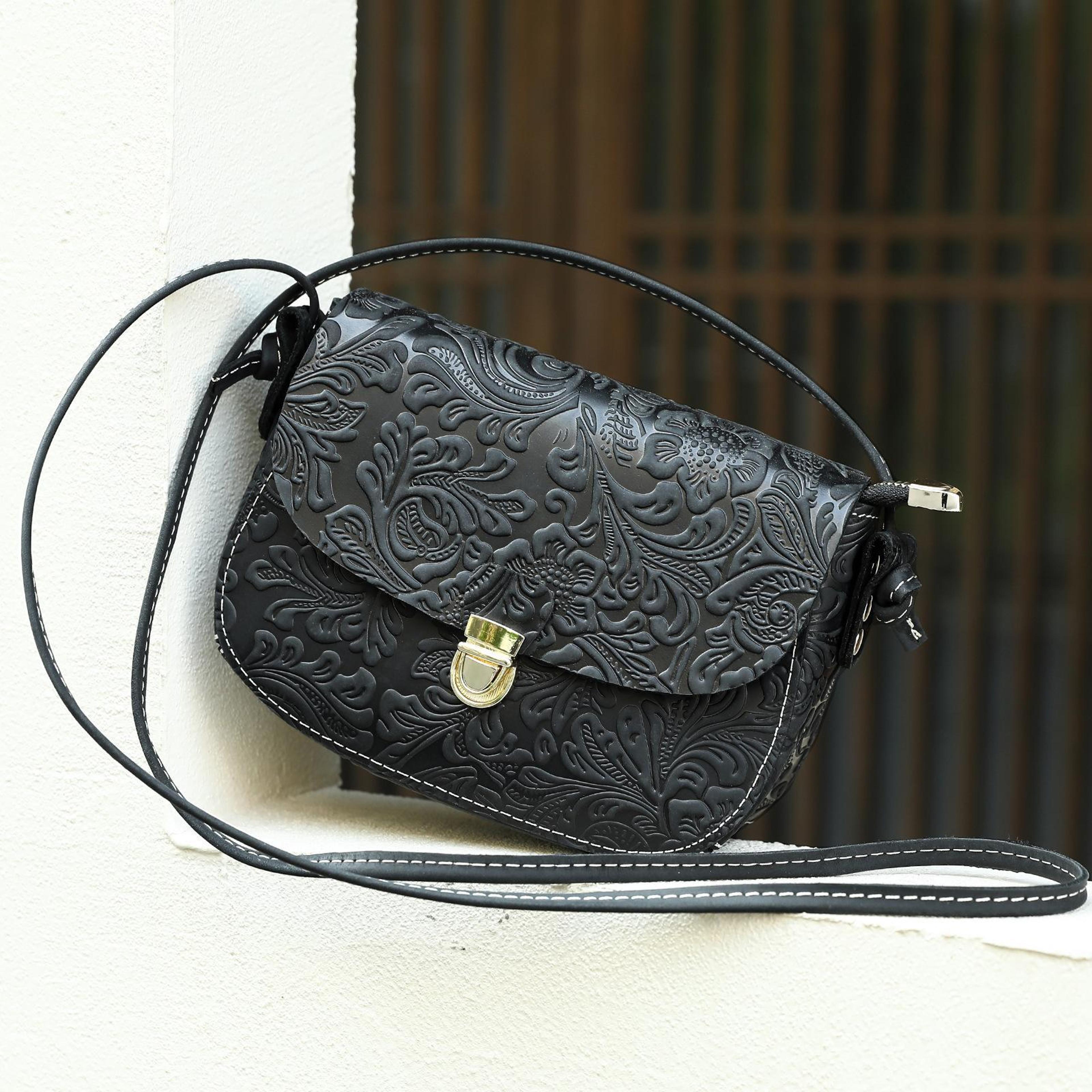 vintage floral embossed leather crossbody bag with adjustable shoulder strap