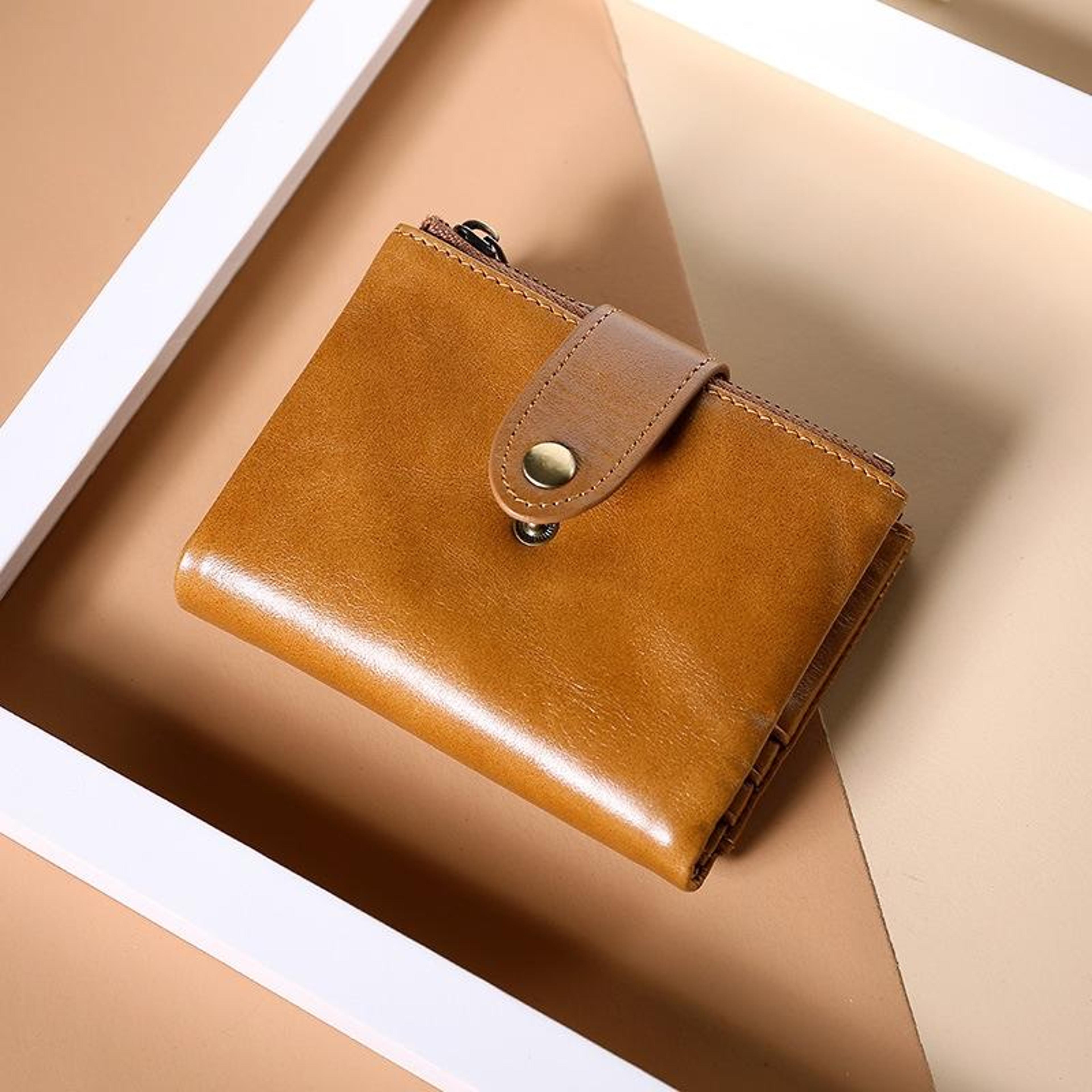 compact leather cosmetic bag and zipper wallet