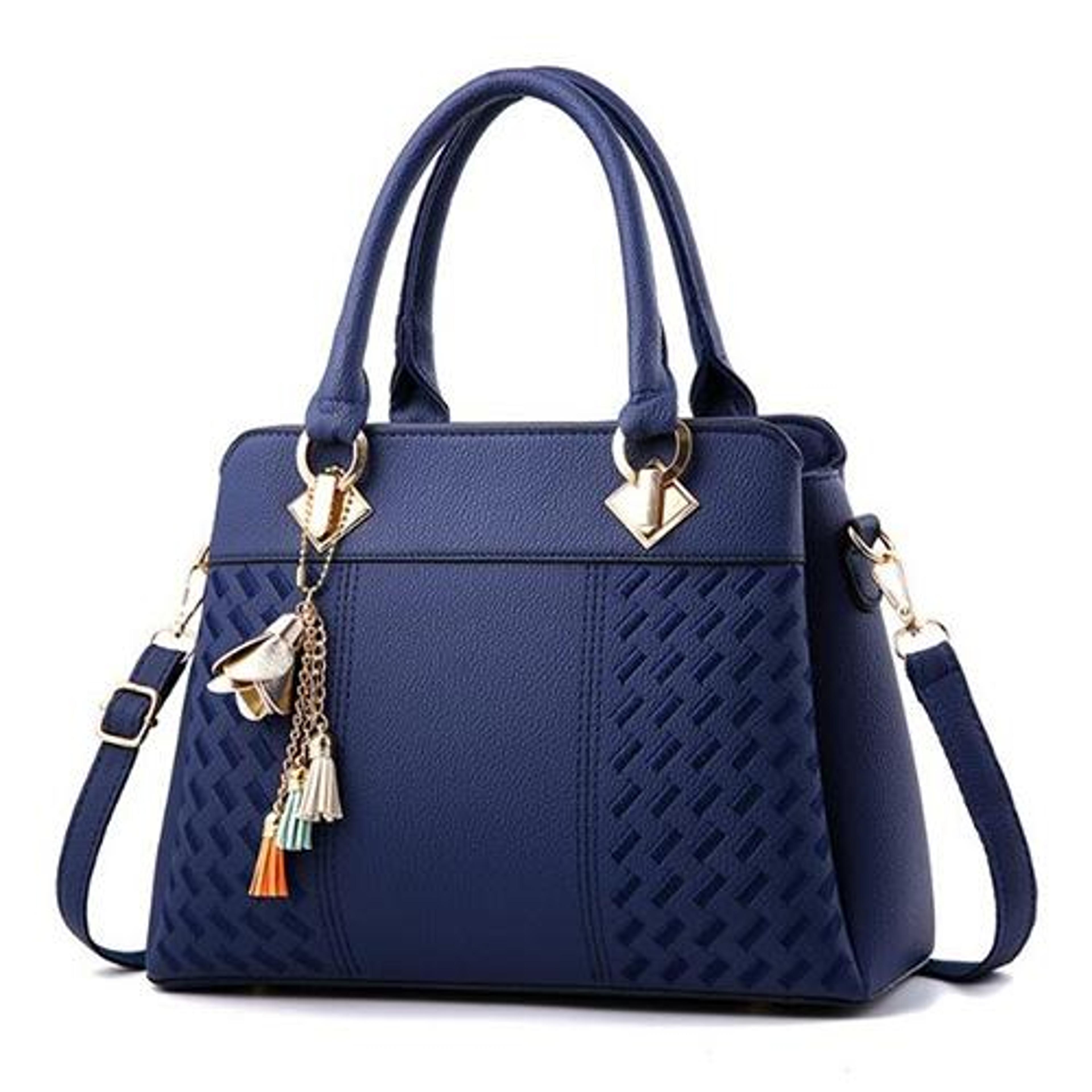 womens embroidered pu leather crossbody bag with tassel detail