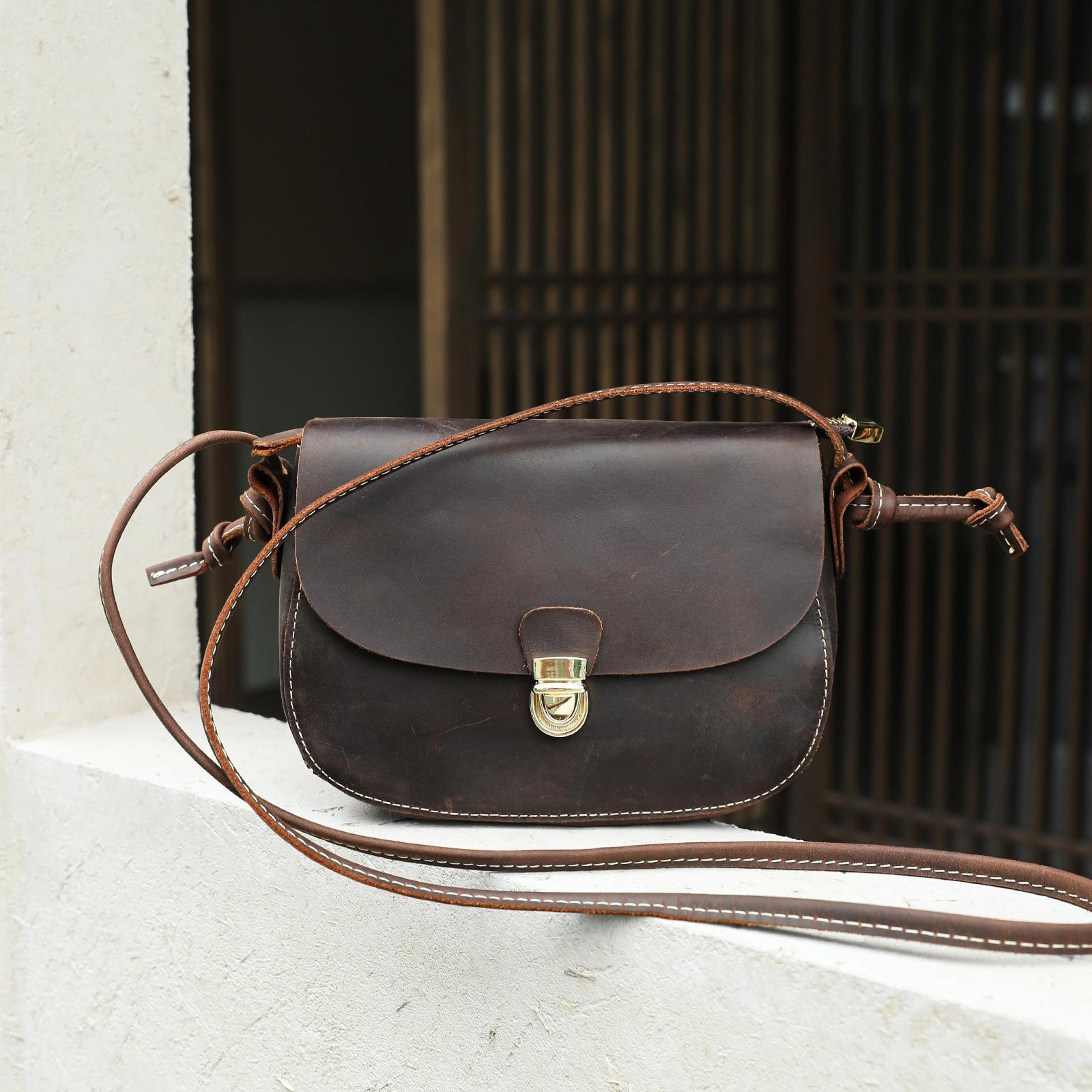 vintage embossed leather crossbody bag with adjustable strap
