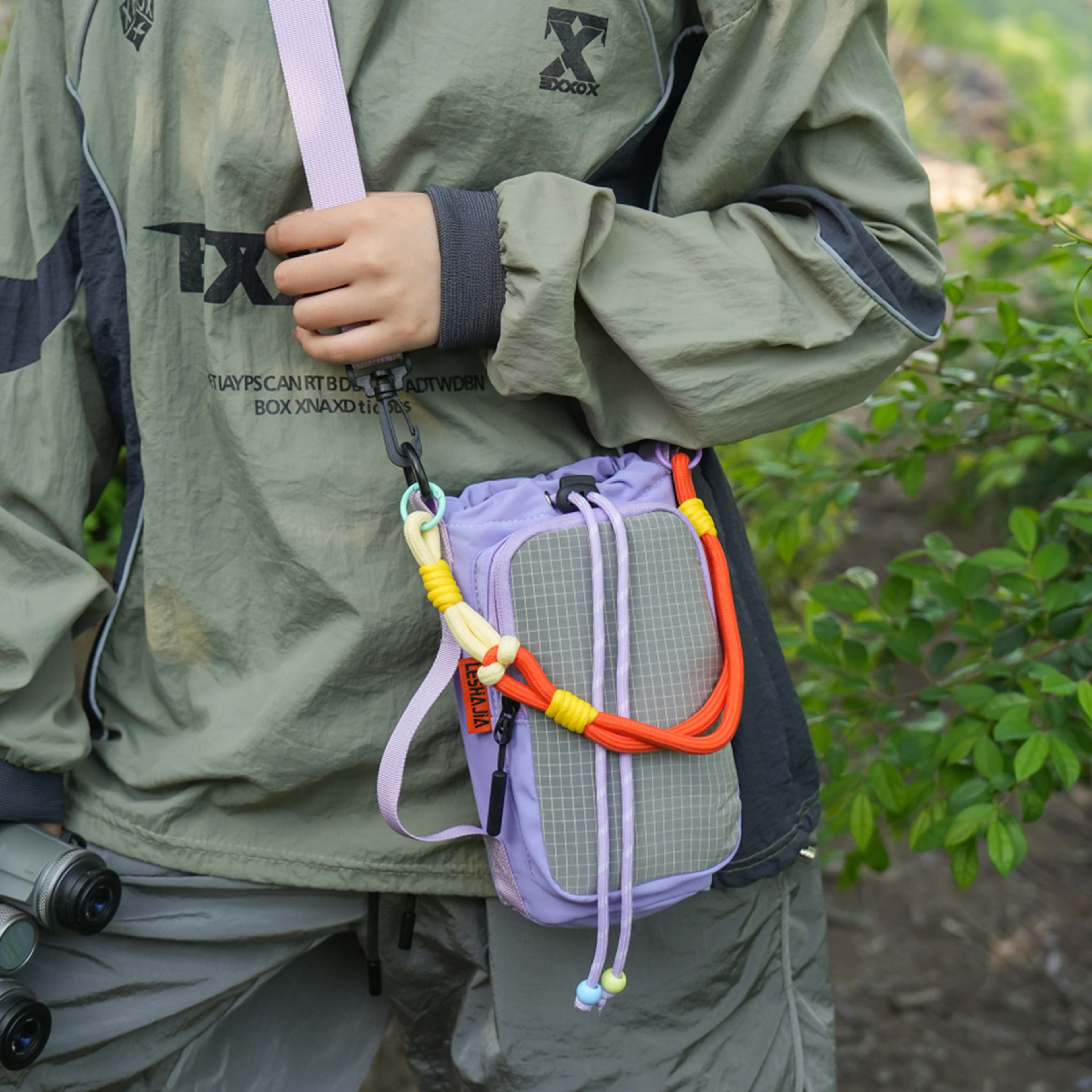 crossbody water bottle bag with zipper and water resistant nylon