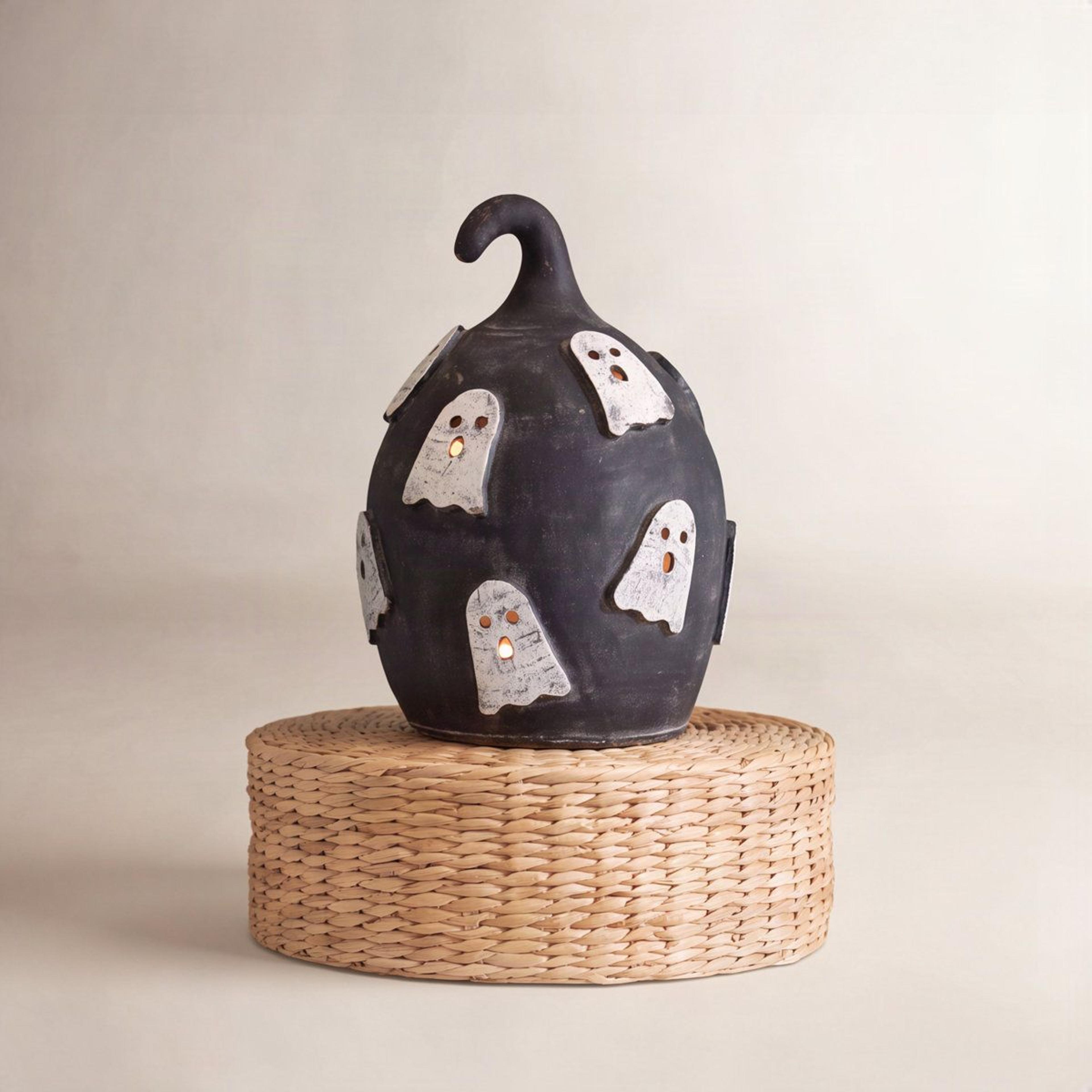 black clay pumpkin luminary with ghost cutouts 14 inch halloween decoration