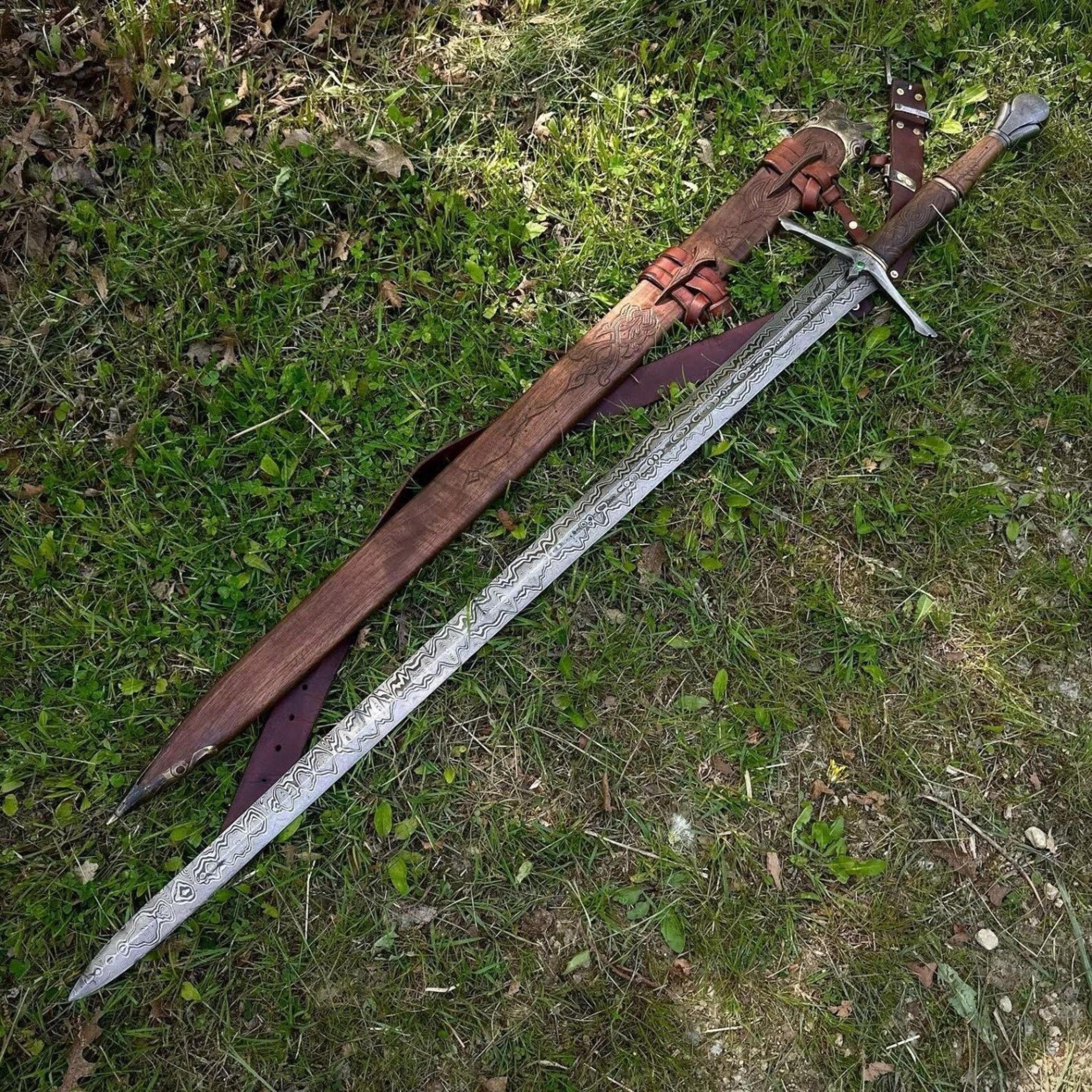 41in damascus viking longsword with patterned steel blade, carved wood grip & leather-bound wood scabbard