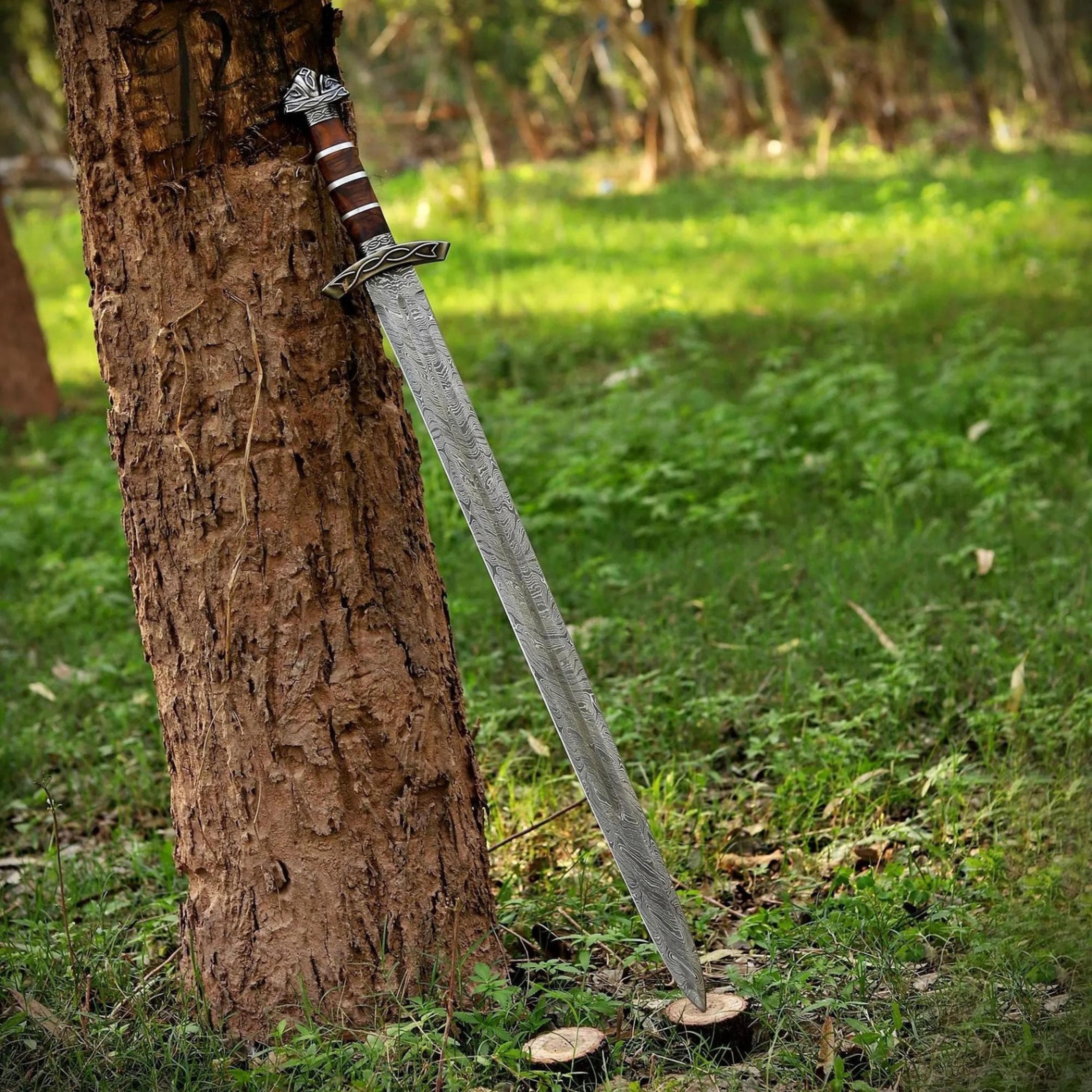 38in damascus viking longsword with patterned steel blade, brown leather grip & engraved silver hilt