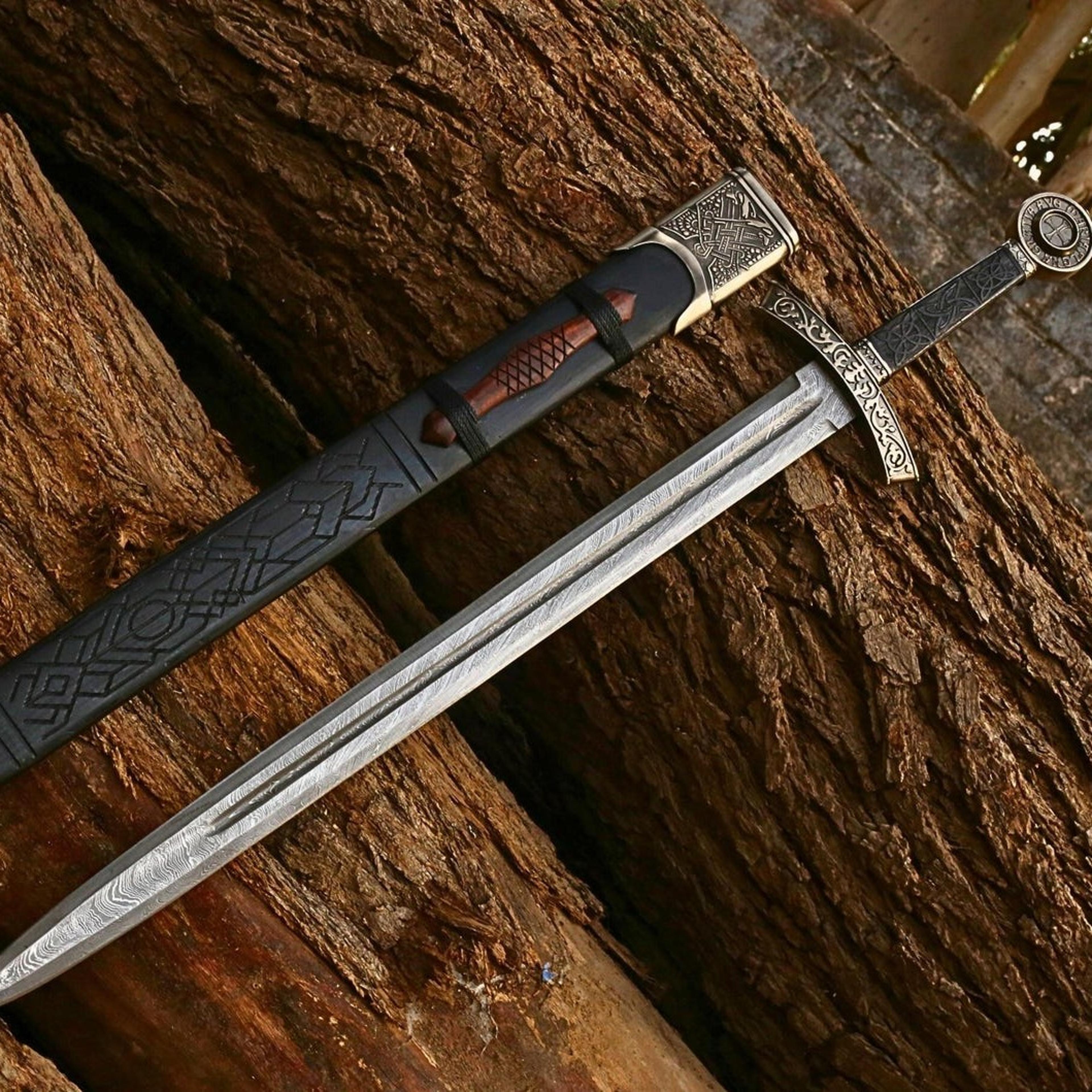 38in norse damascus longsword with patterned steel blade, engraved hilt & black nordic scabbard