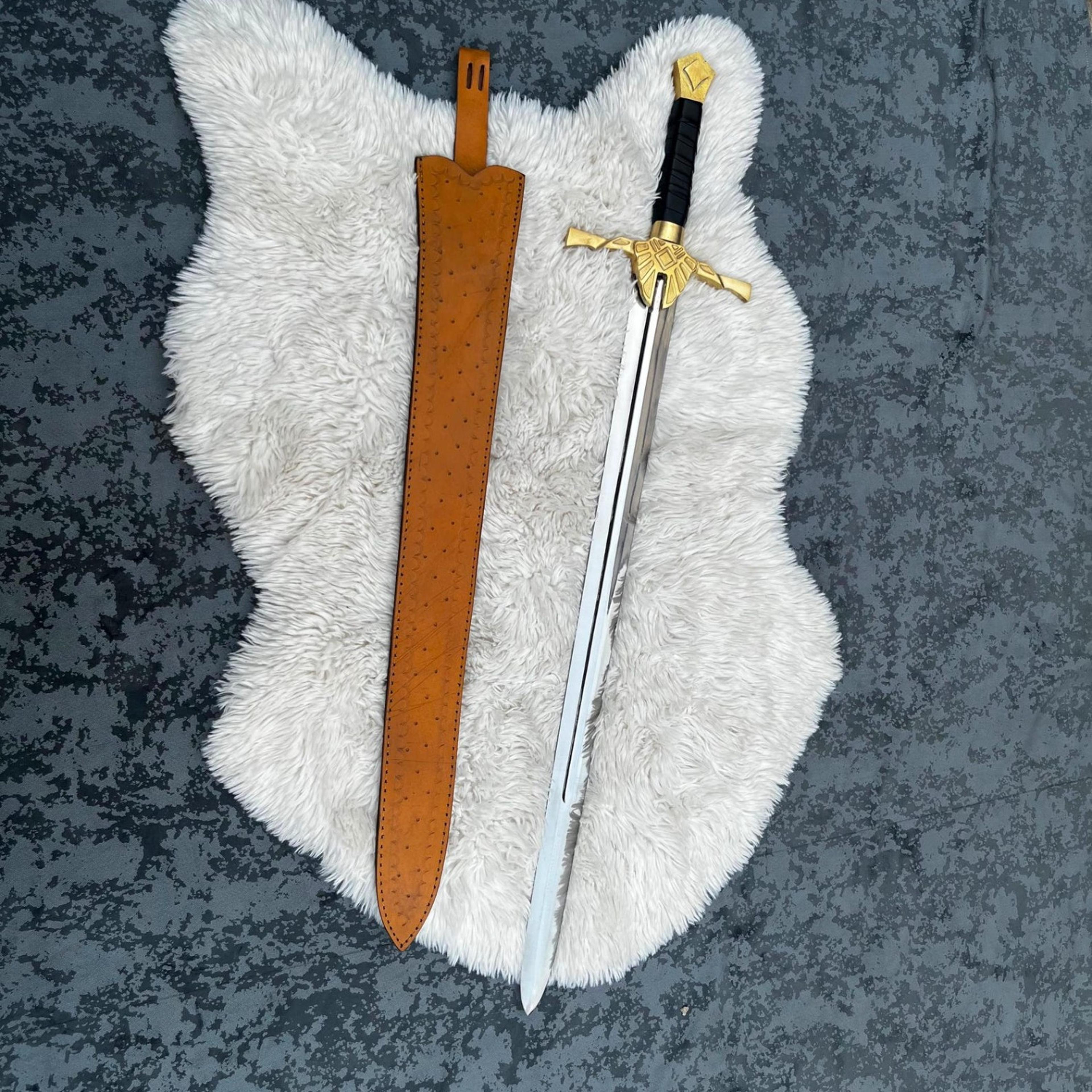 38in golden wing fantasy longsword with polished steel blade, black grip & tan leather scabbard