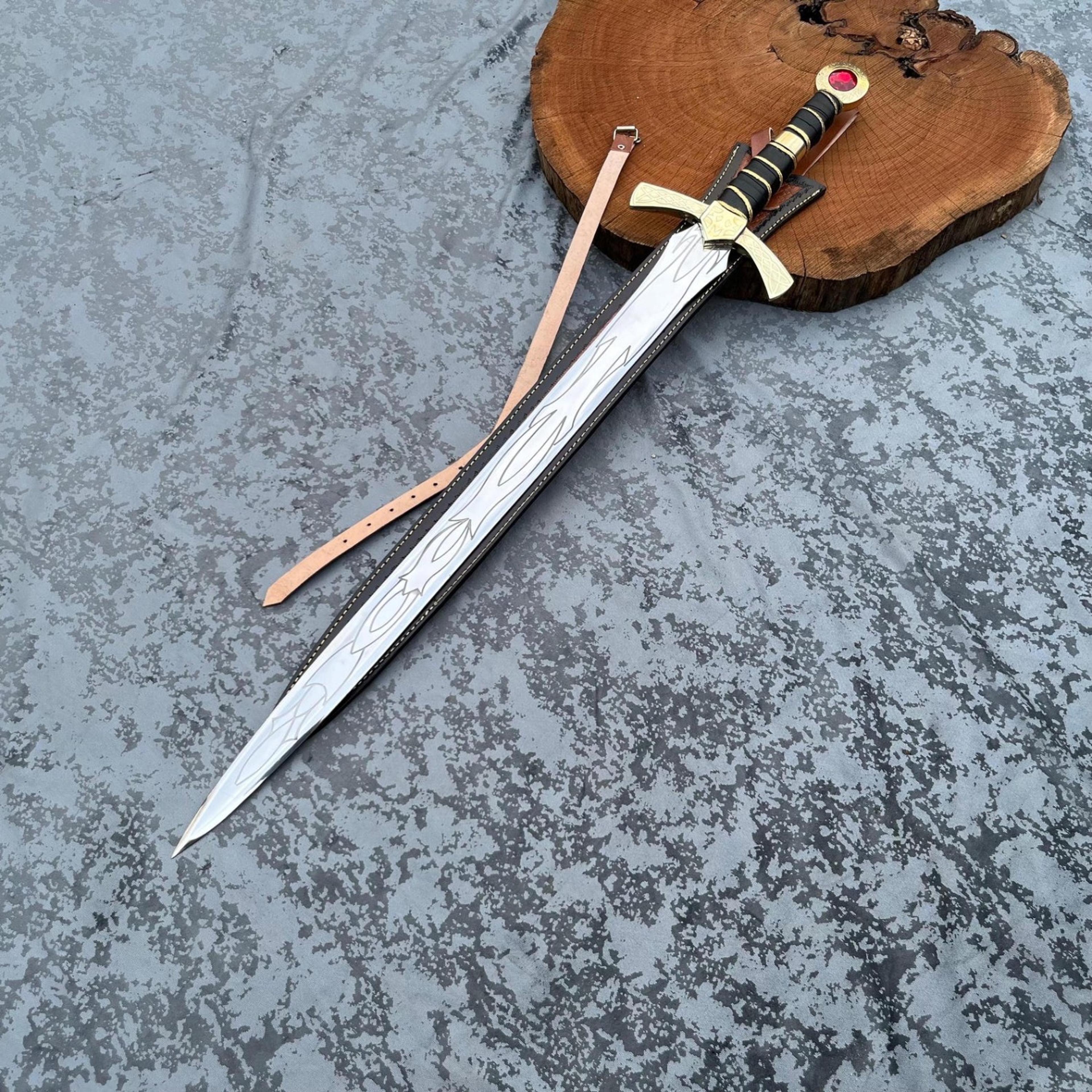 36in ruby crest fantasy longsword with engraved steel blade, gold hilt & black leather sheath