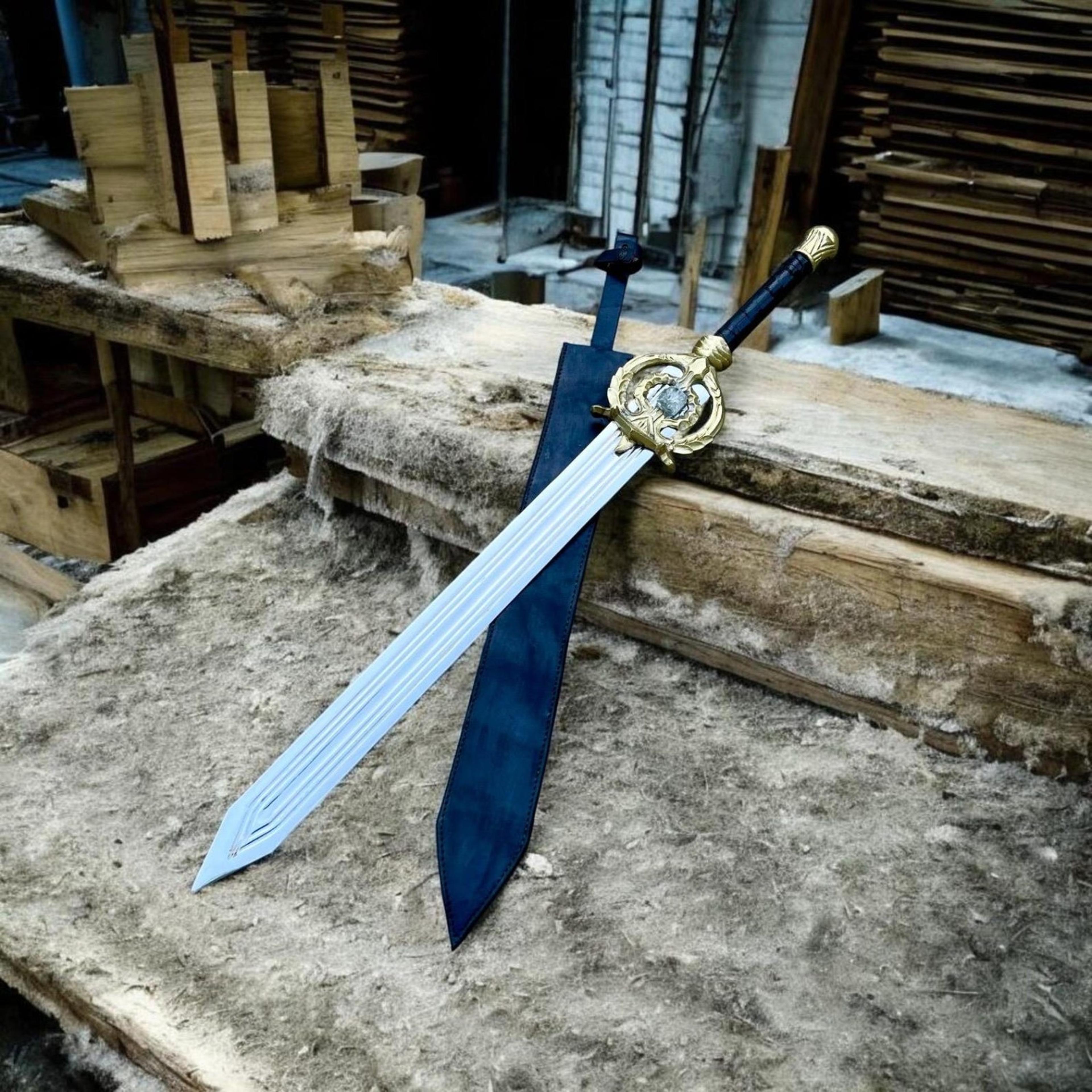 38in dragon crest fantasy longsword with polished steel blade, gold guard, black grip & blue scabbard