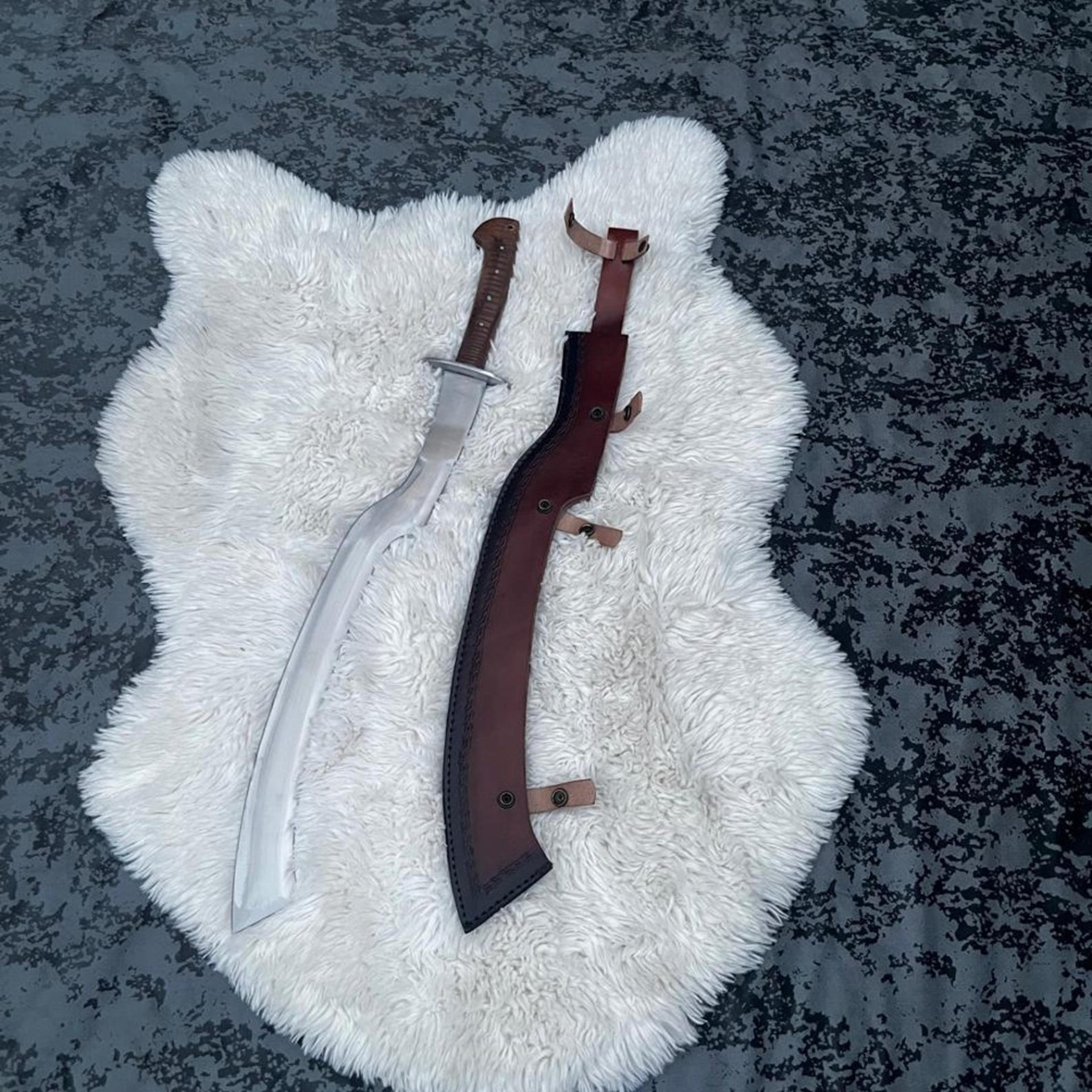 24in curved kukri machete with polished steel blade, brown wrapped grip & leather sheath