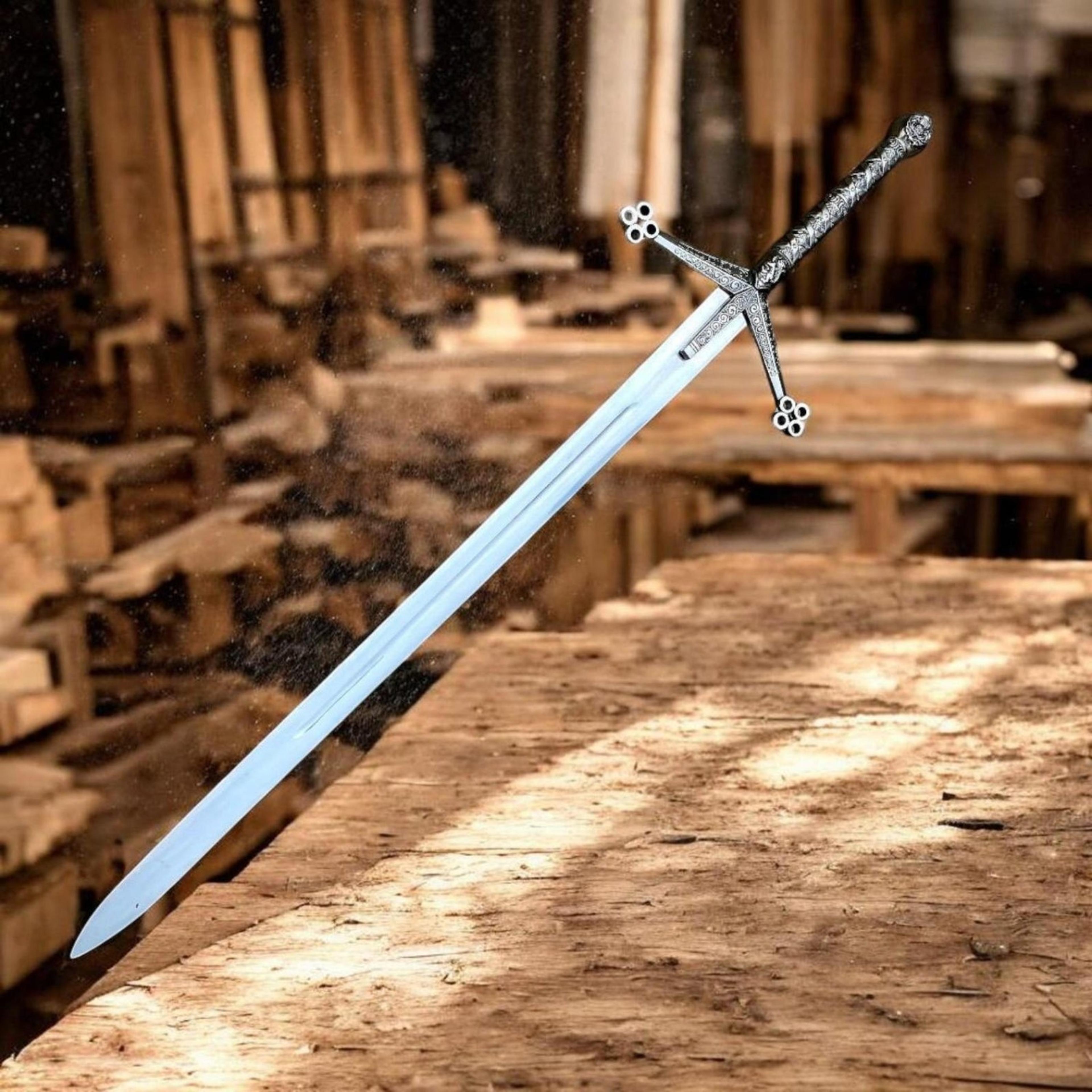 38in four-ring medieval longsword with polished steel blade, engraved hilt & ornate quillon guard