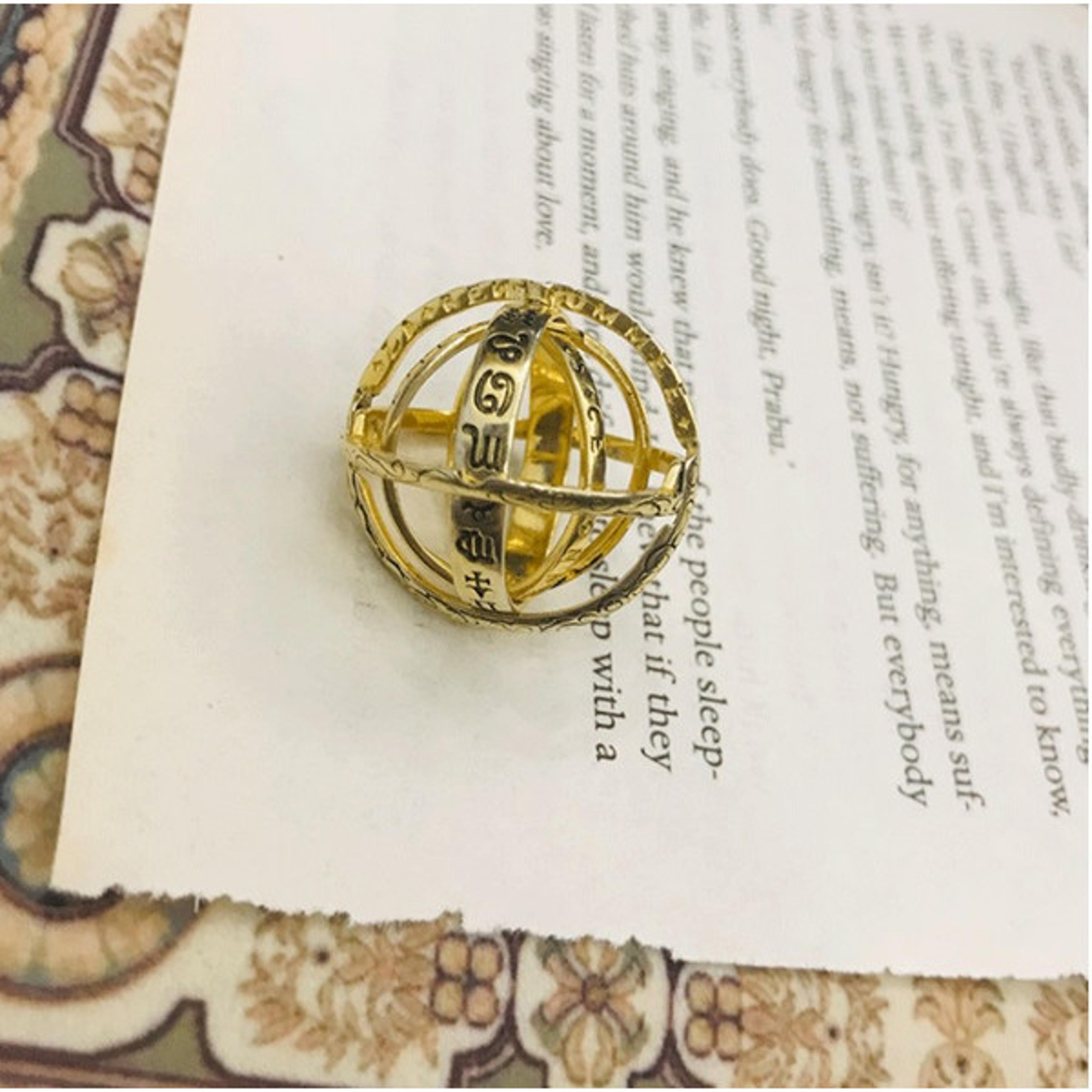 handmade sphere spinner ring
