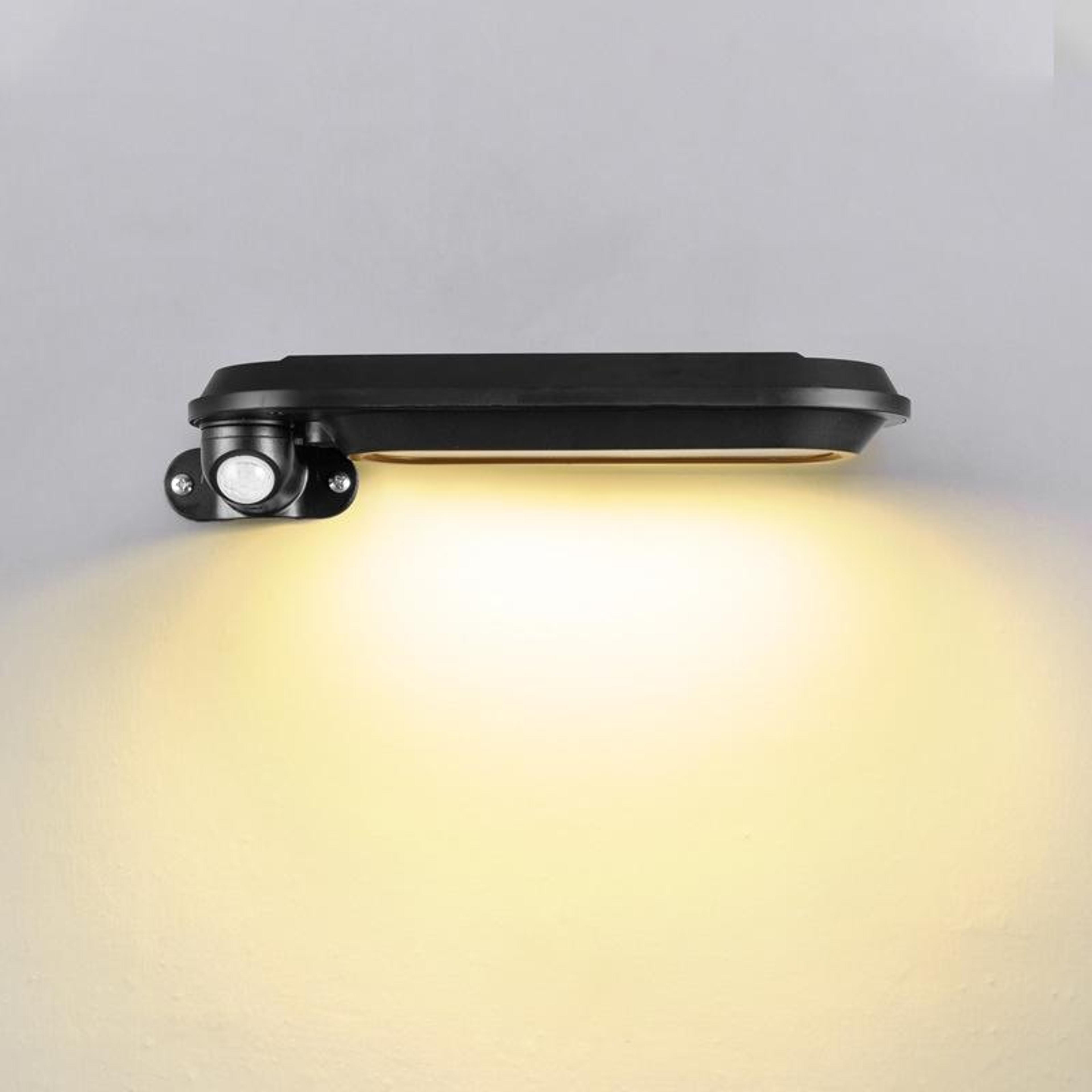 solar wall lamp outdoor garden motion sensor street light, black warm glow