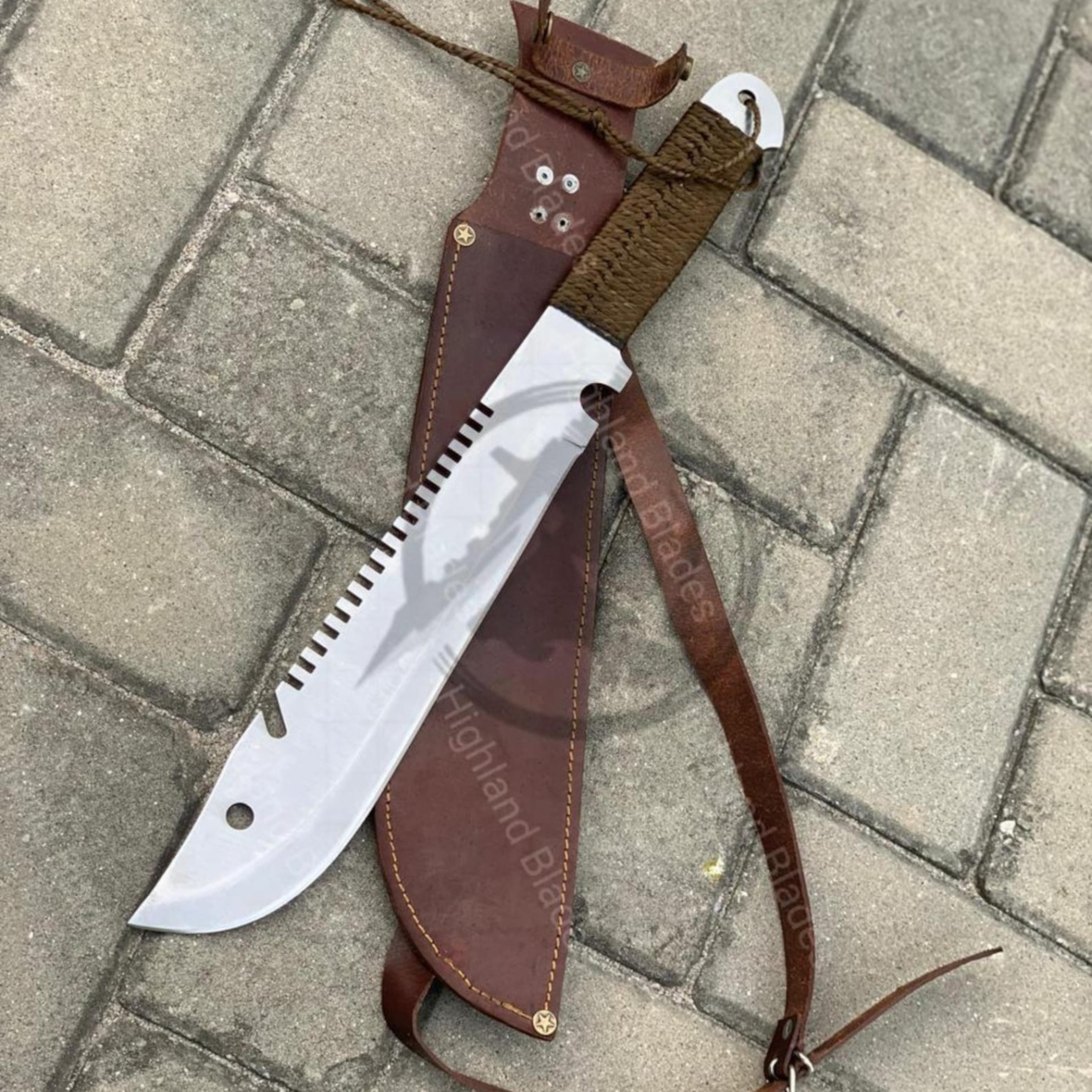 18in sawback survival machete with polished steel blade, cord-wrapped handle & brown leather sheath