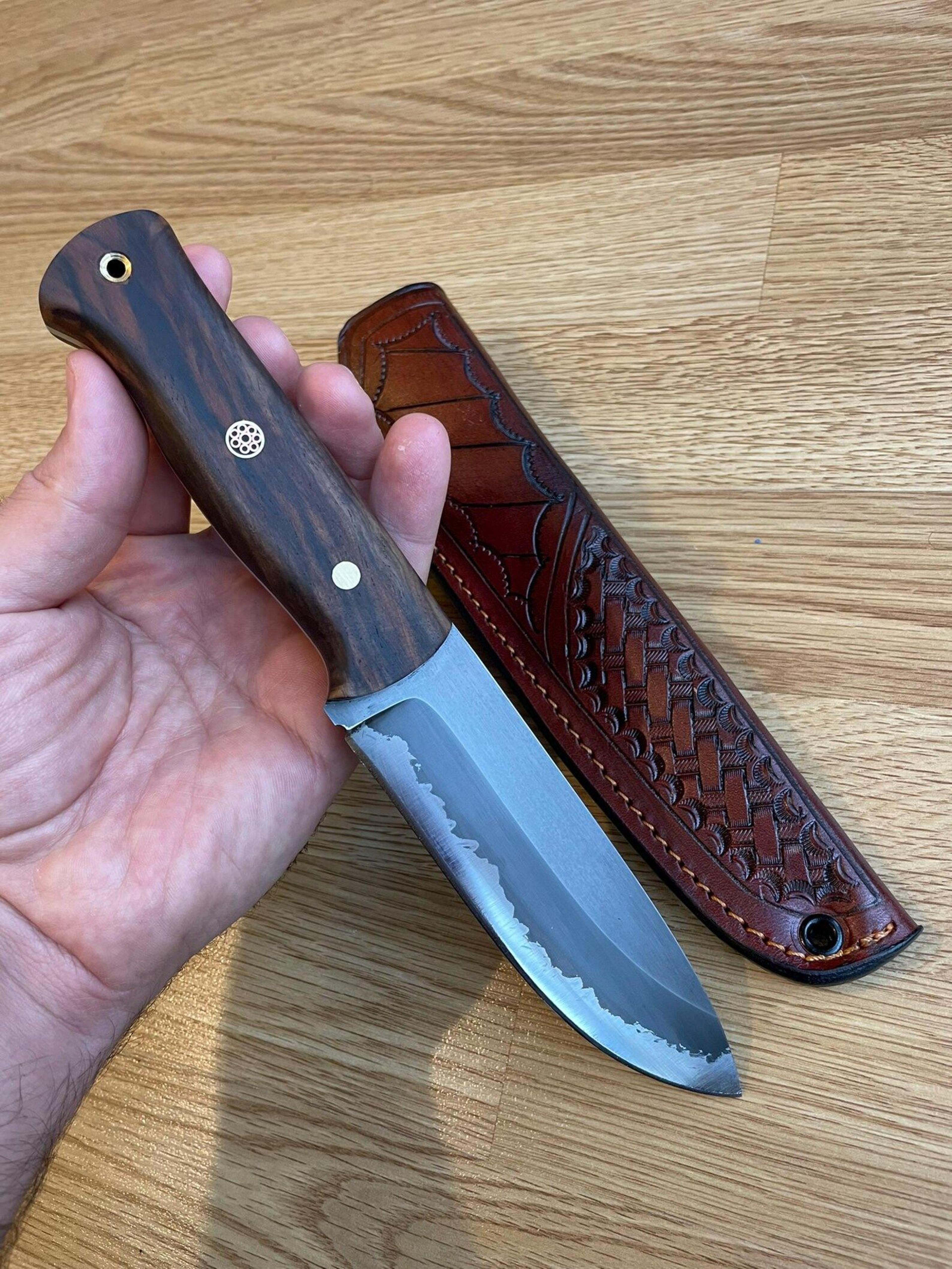 rugged outdoor camping knife with walnut wood grip & darkened steel blade