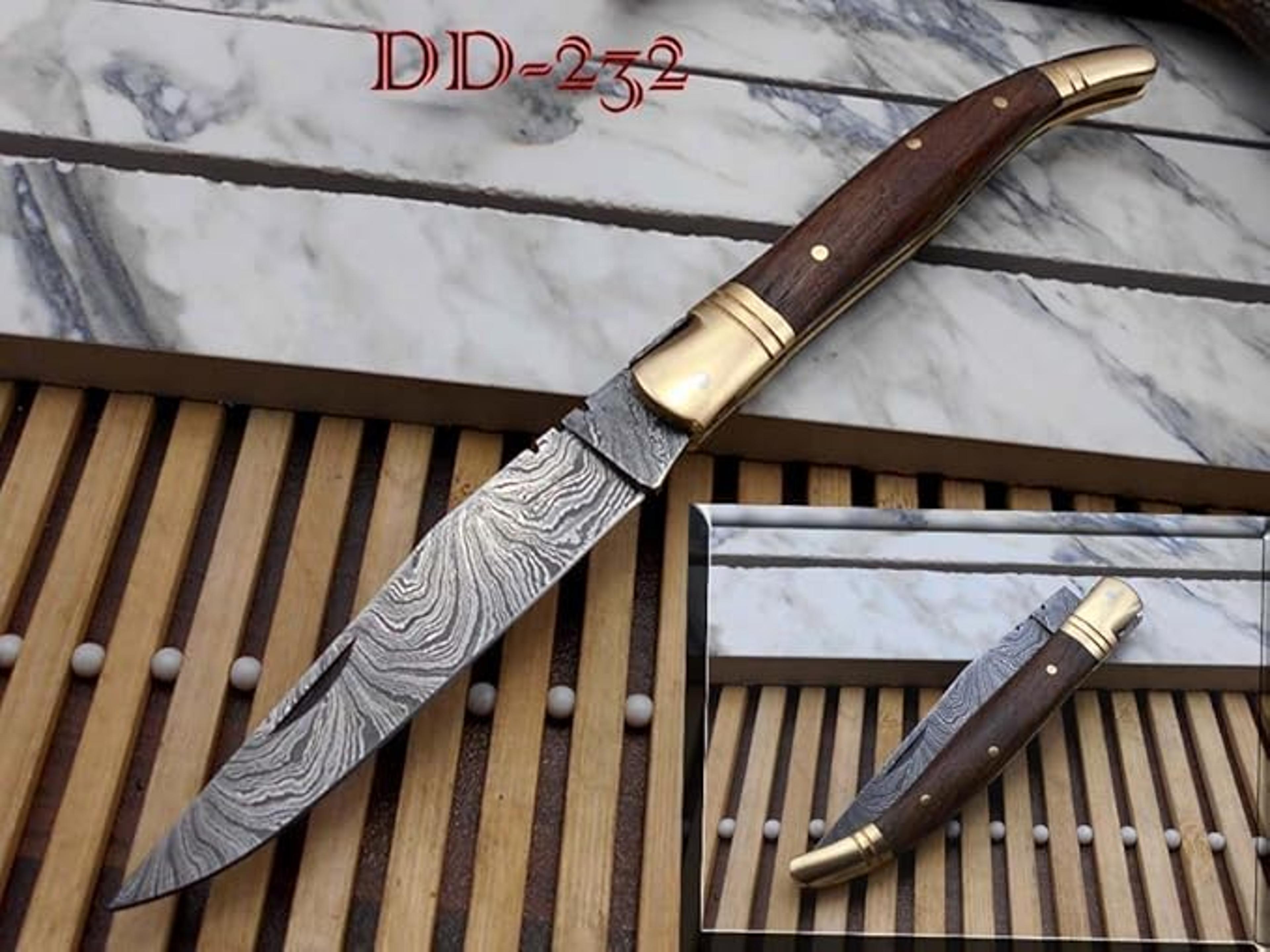 laguiole folding damascus steel knife, 8.5" long with 4" hand forged twist patren blade. rose wood & brass bolster scale