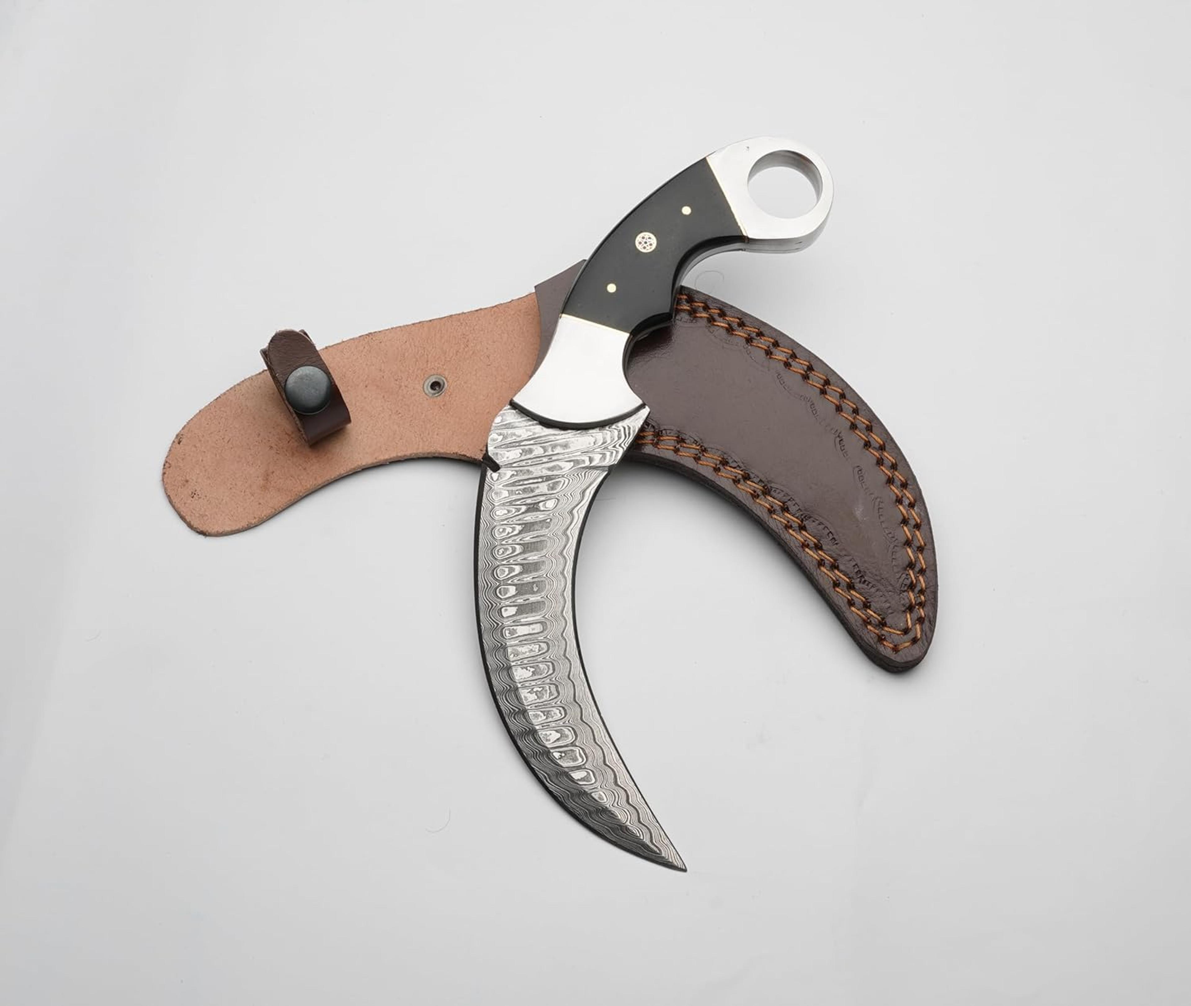 karambit knife | black and silver handle & damascus steel blade | sleek two-tone design for a premium look