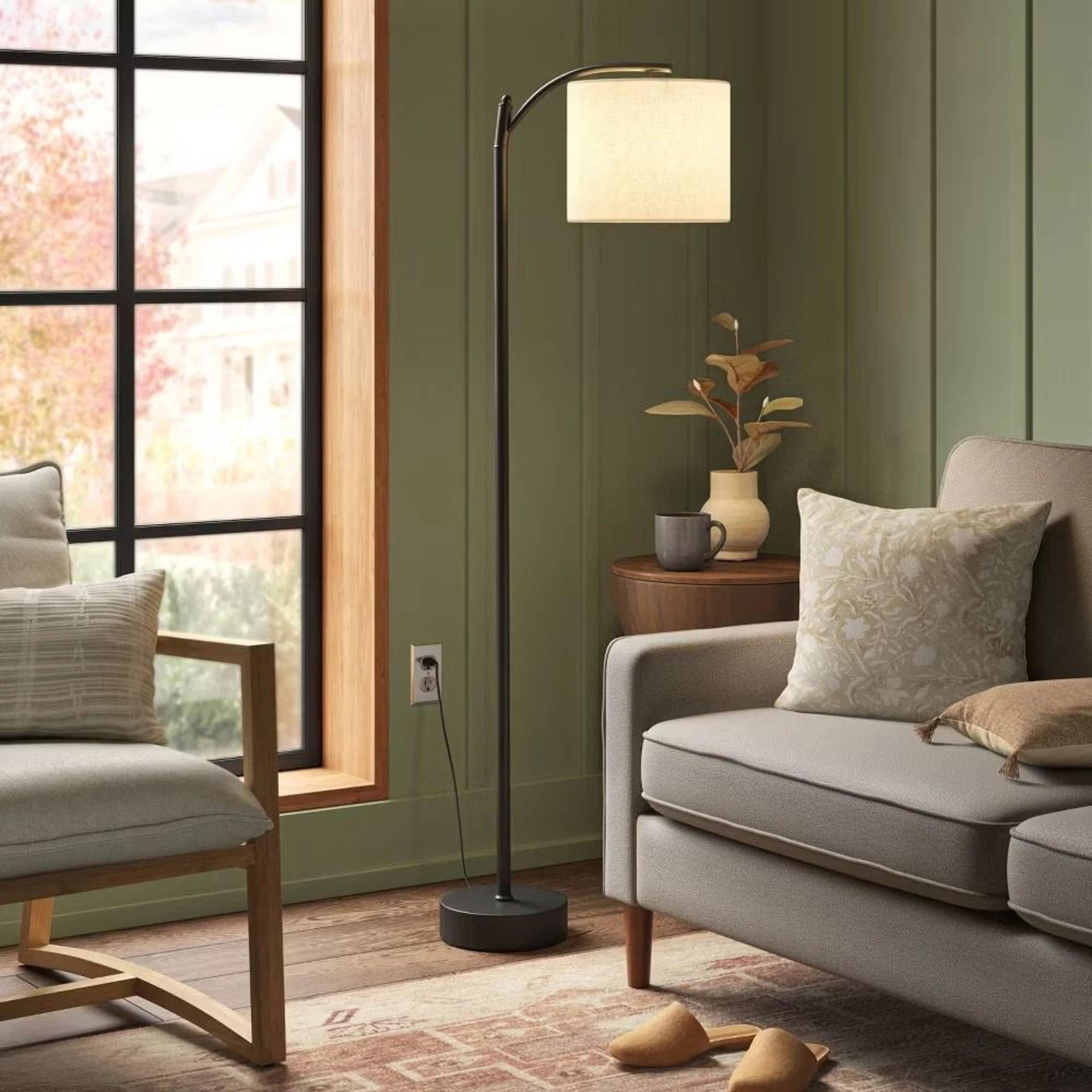 threshold downbridge floor lamp with black/tan shade, ambient light, metal base, linen drum for living room