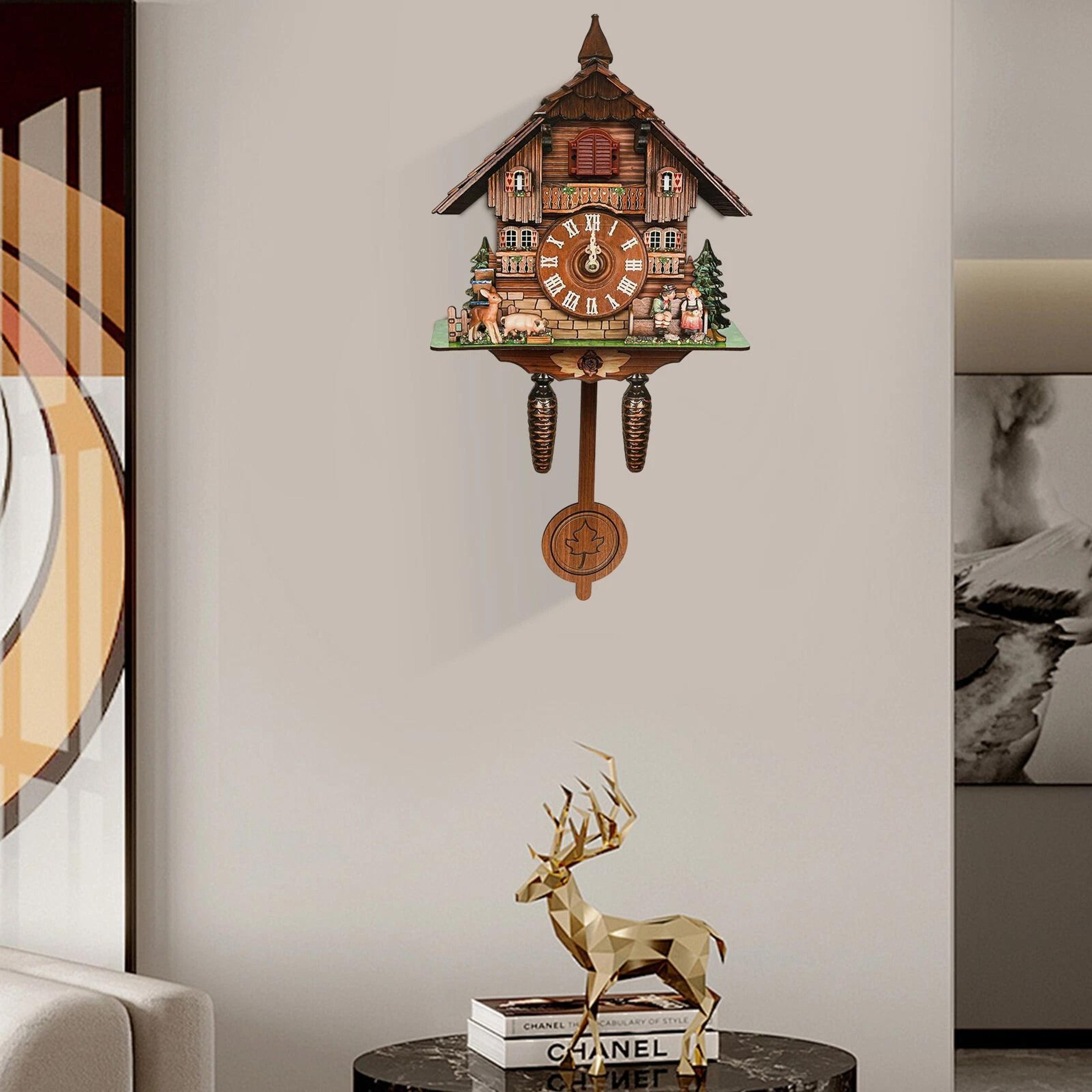elegant vintage cuckoo wall clock with black forest design and singing feature