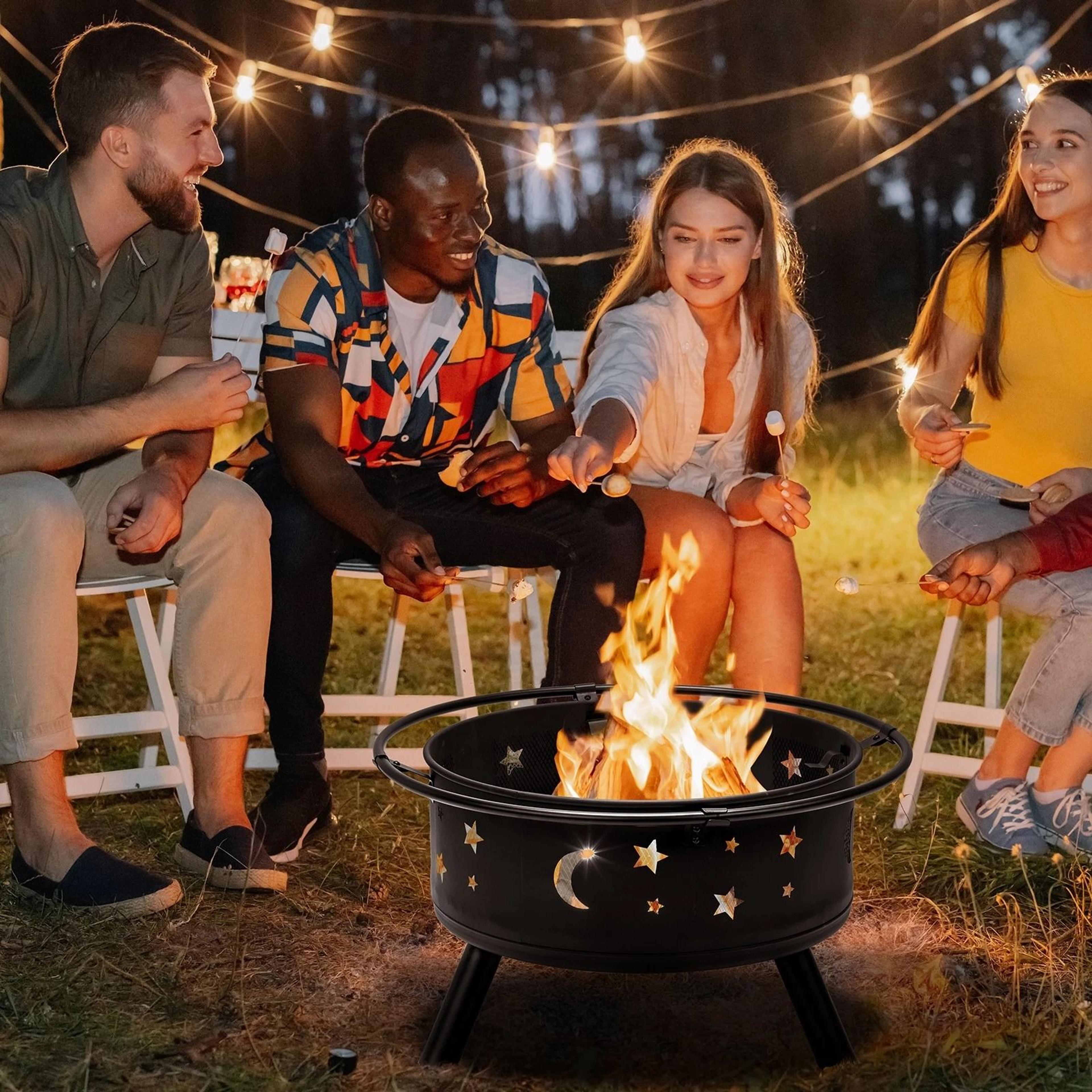 metal fire pit with spark screen and fire poker for outdoor wood burning, black