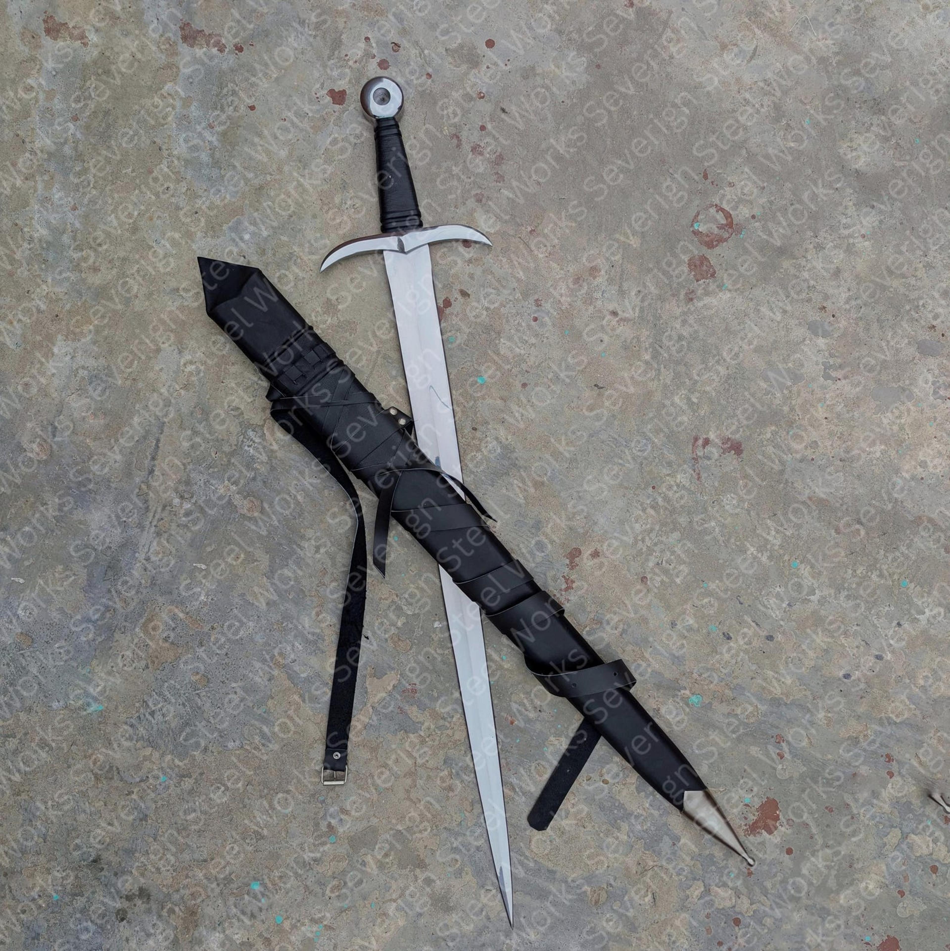 hand forged medieval longsword replica with polished steel blade, black wrapped grip & leather scabbard