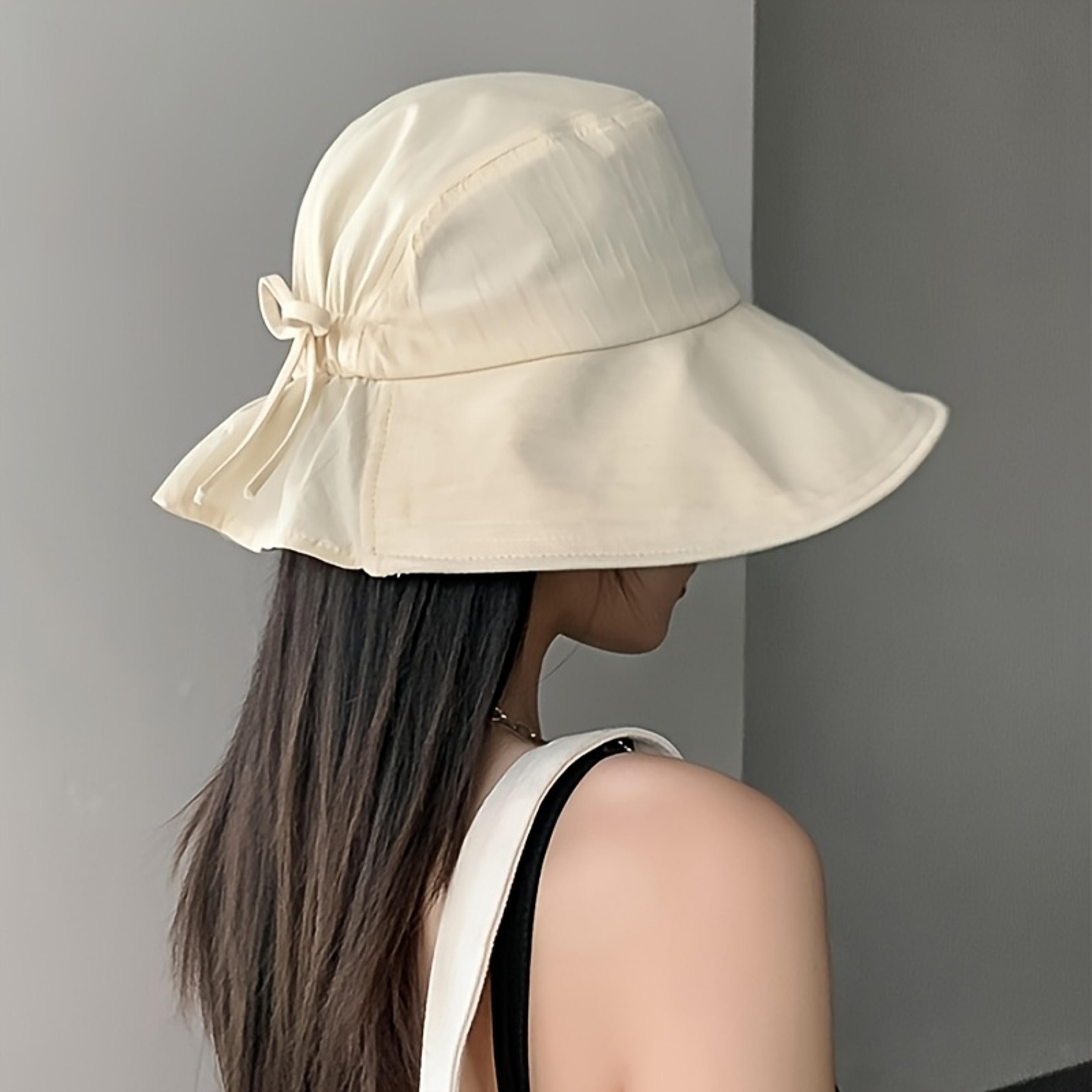 womens wide brim foldable sun hat with bow | lightweight beach & travel sun protection hat