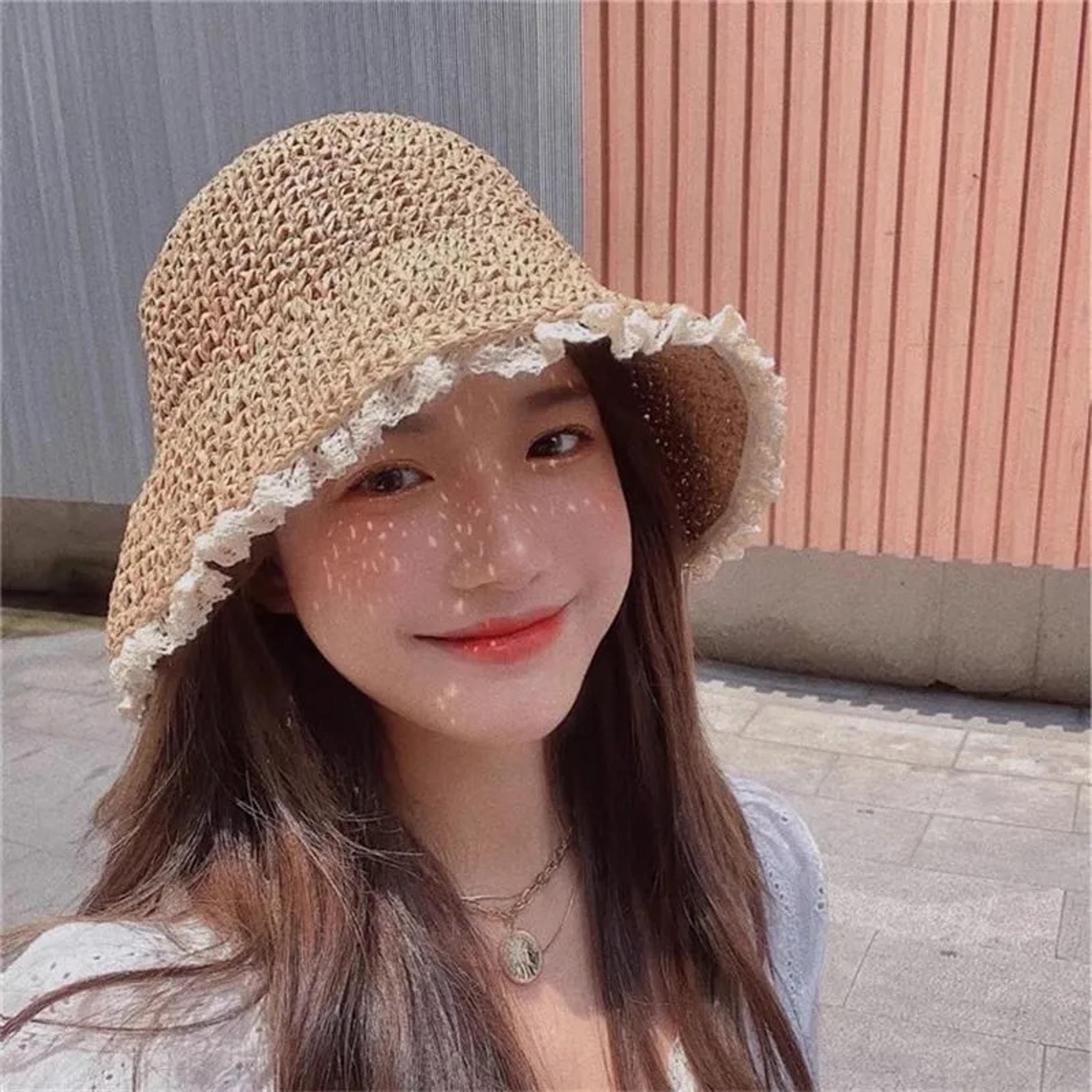 women's foldable straw crochet bucket hat with lace tie