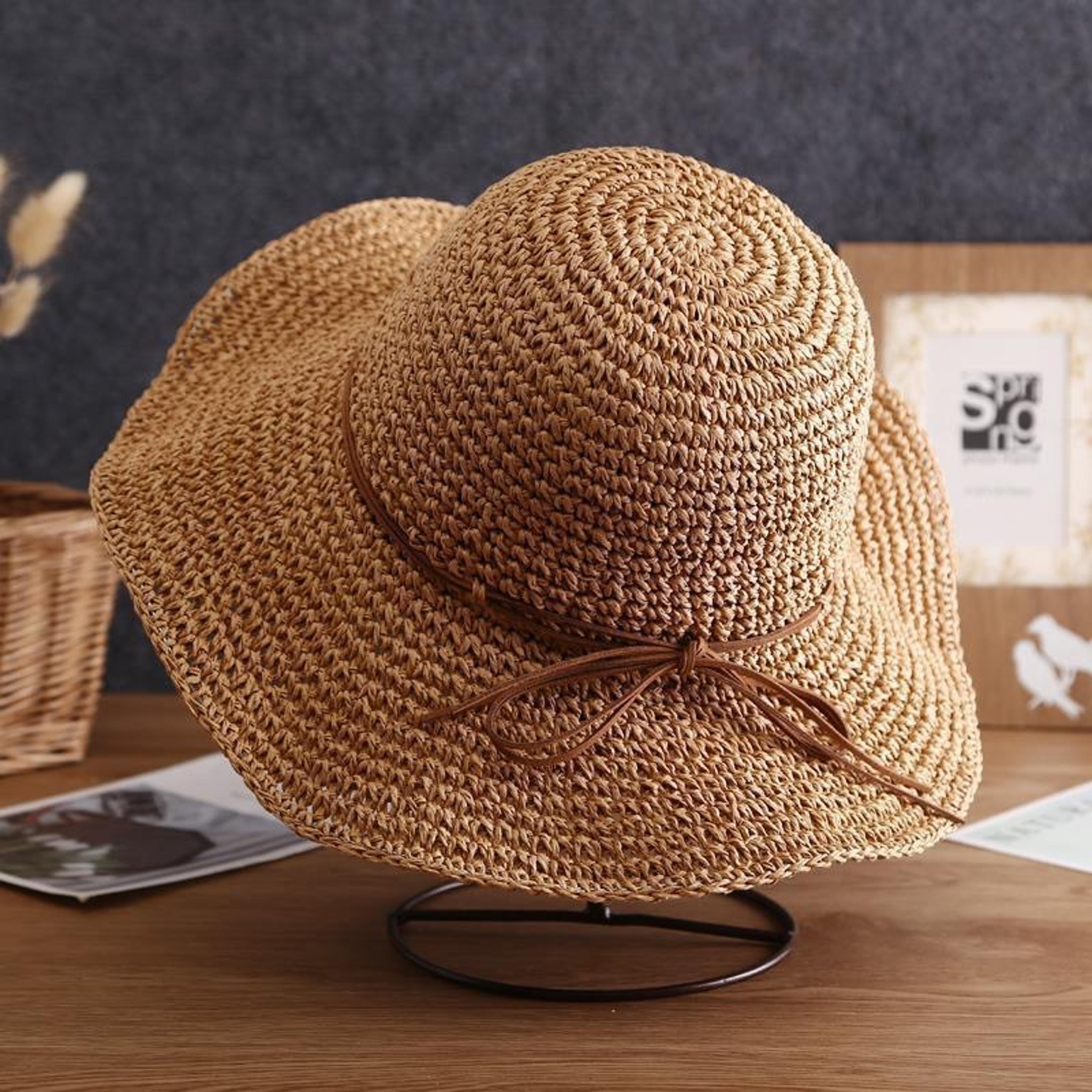 wide brim woven straw sun hat with elegant bow accent