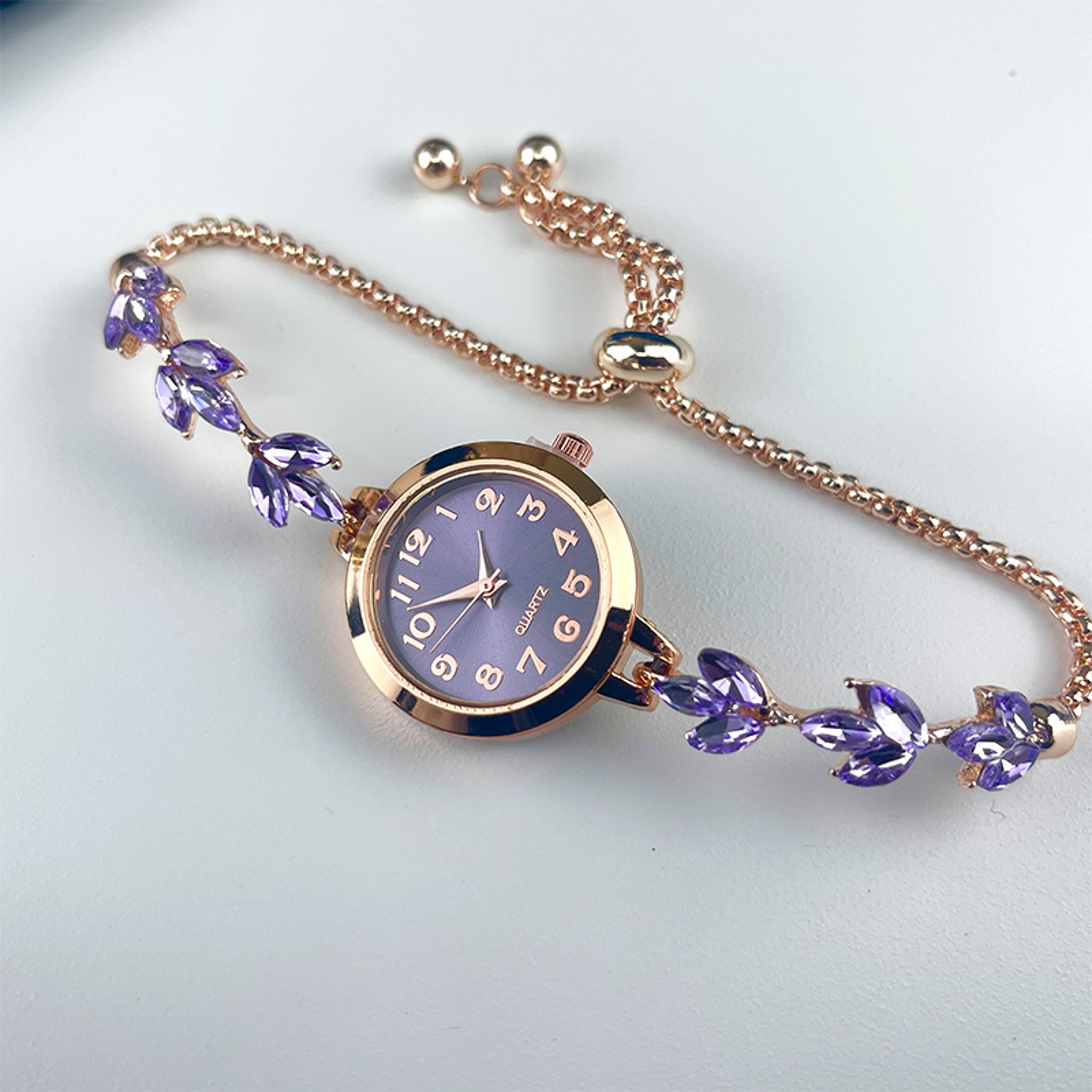 elegant ladies quartz watch, round alloy case, arabic numeral dial, leaf-shaped diamond-studded bracelet