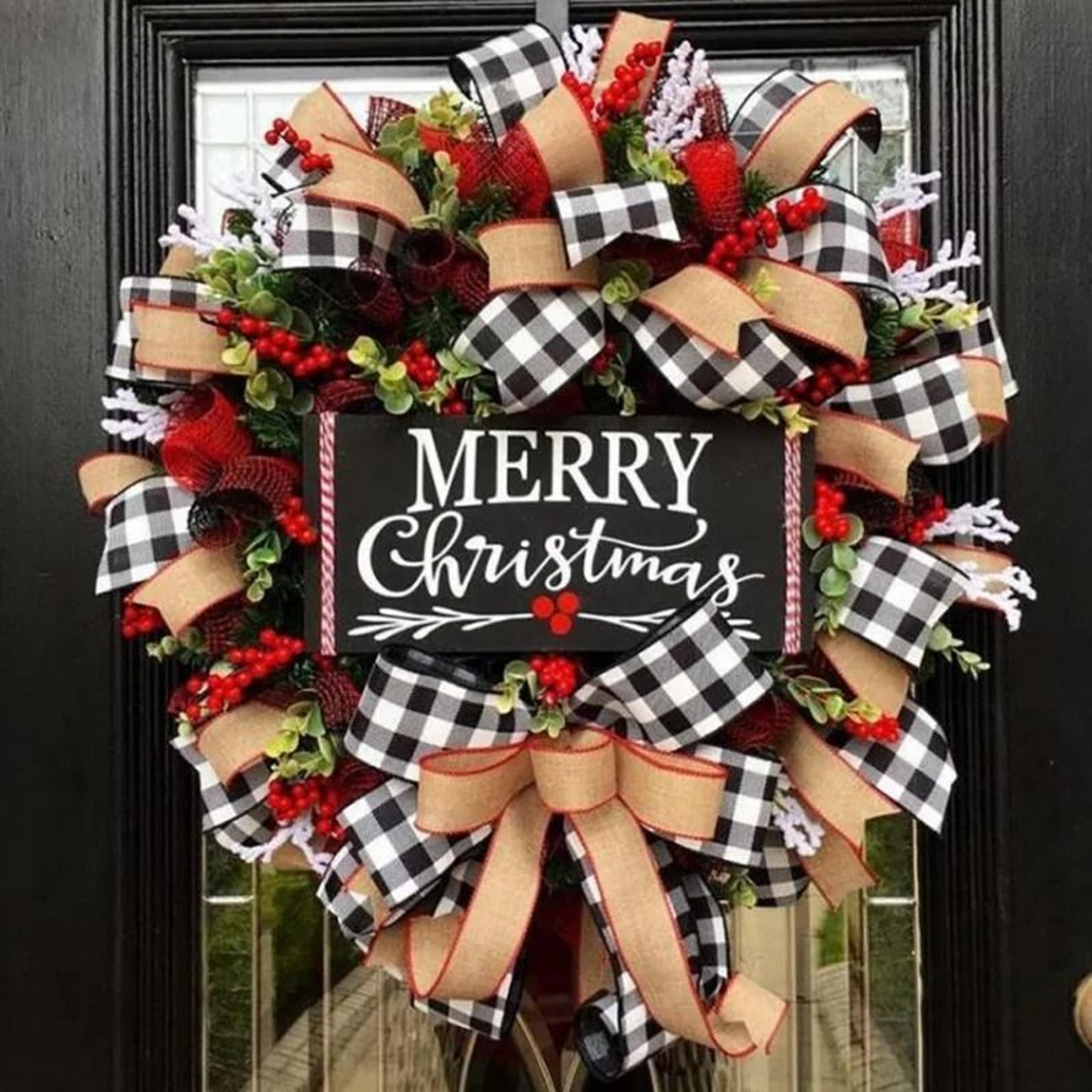 christmas letter wreath with red berry accents for door decor