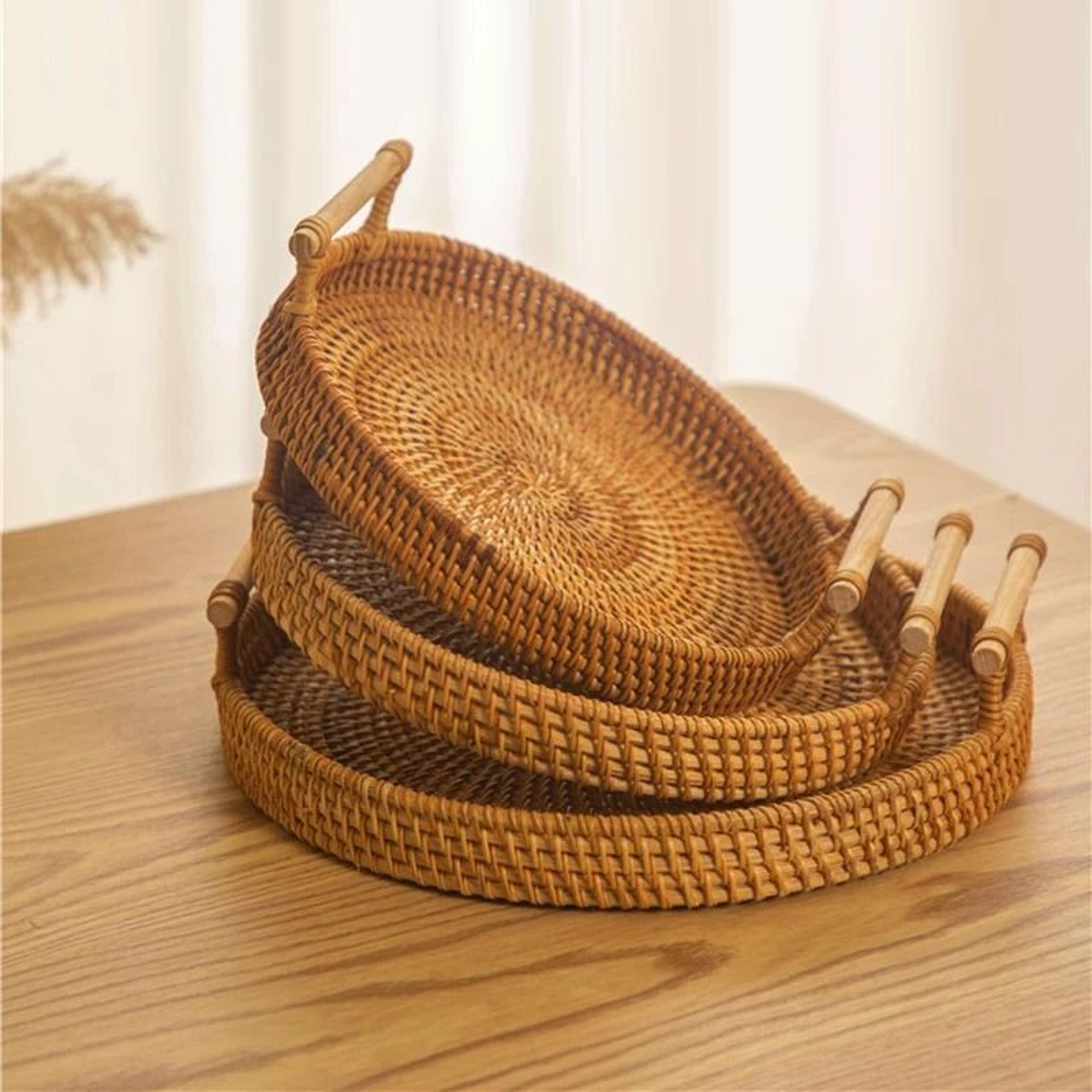 woven rattan round storage basket tray with strap handle for snacks and picnic