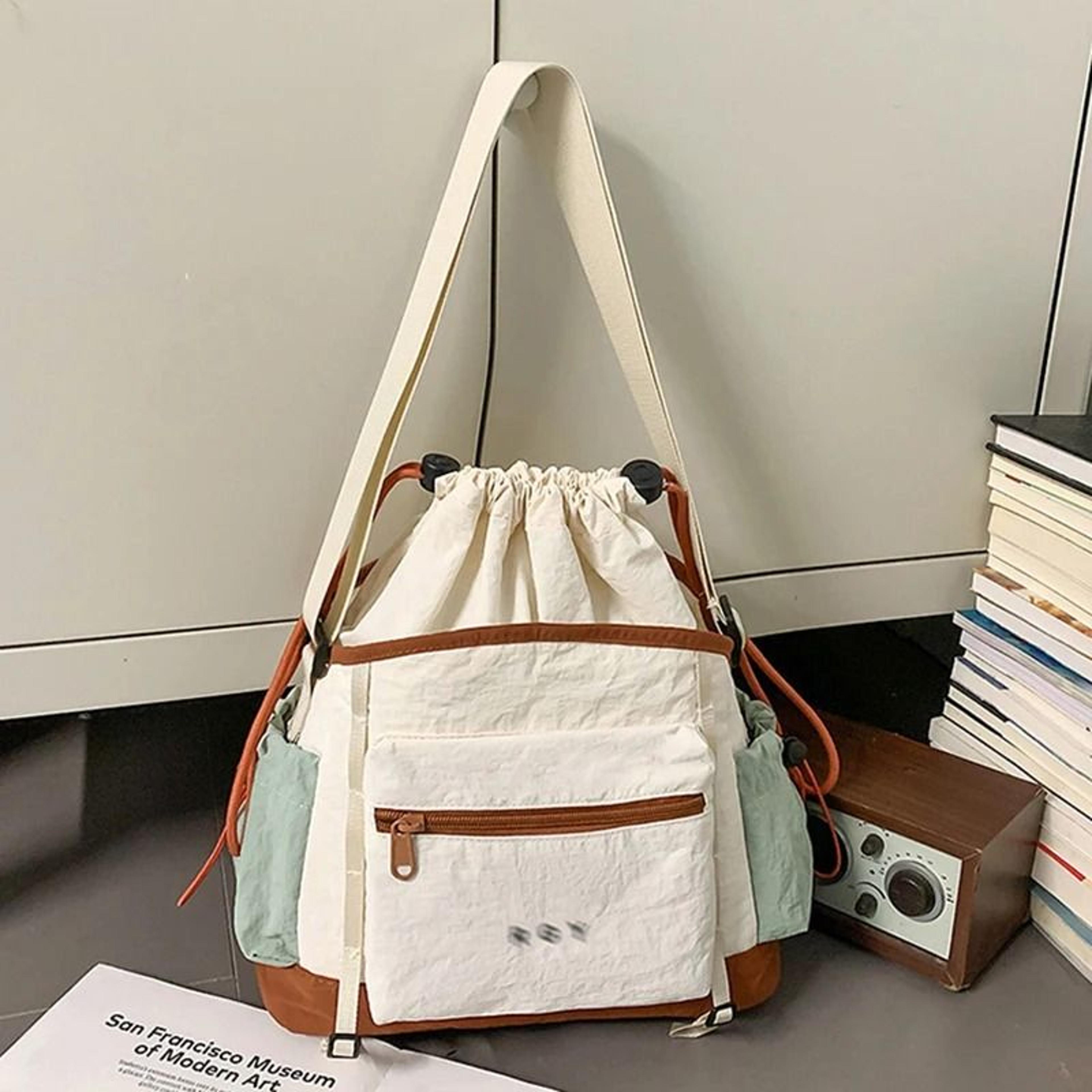 versatile crossbody sports bucket bag for hiking and commuting