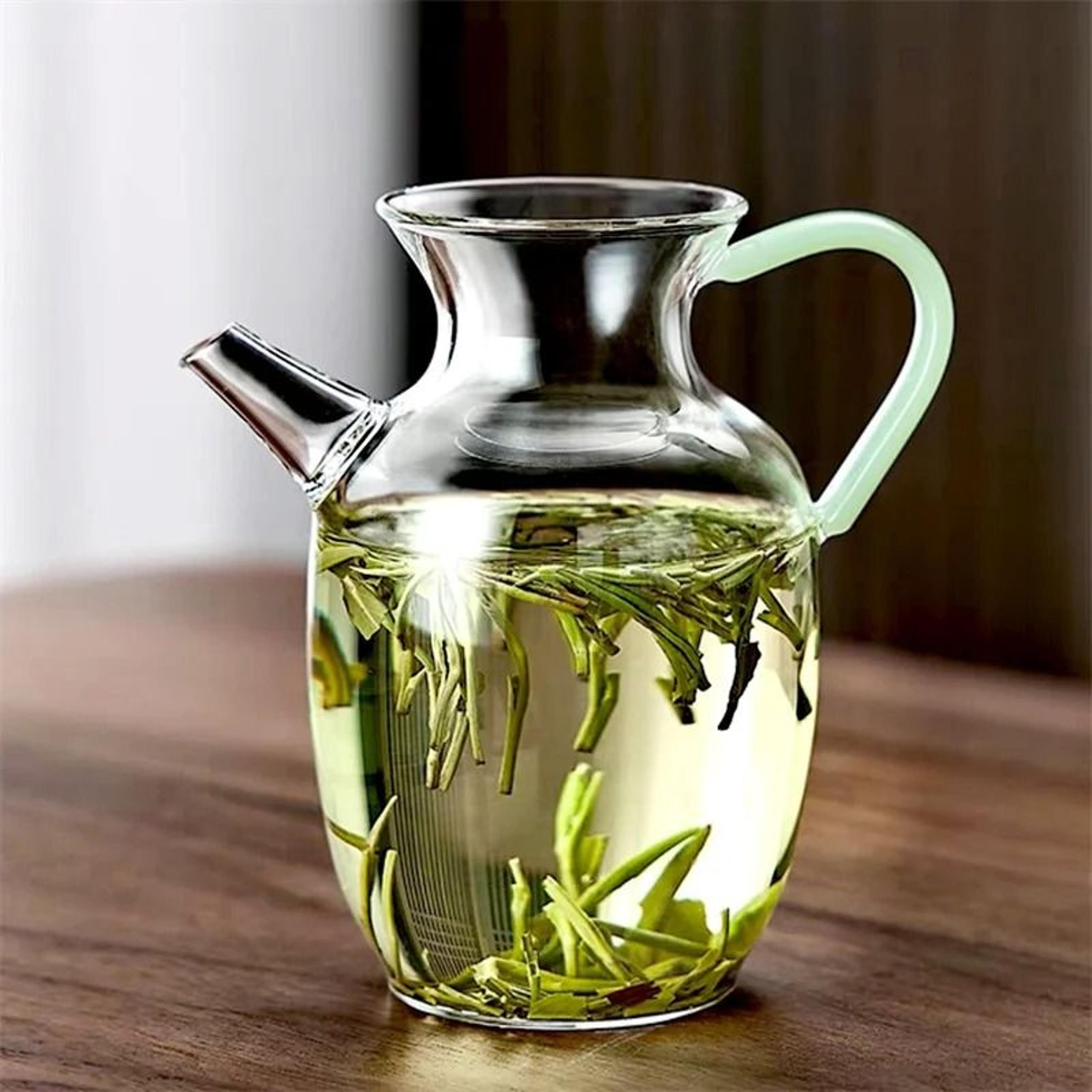 heat resistant glass teapot with imitation jade handle and vintage song style design