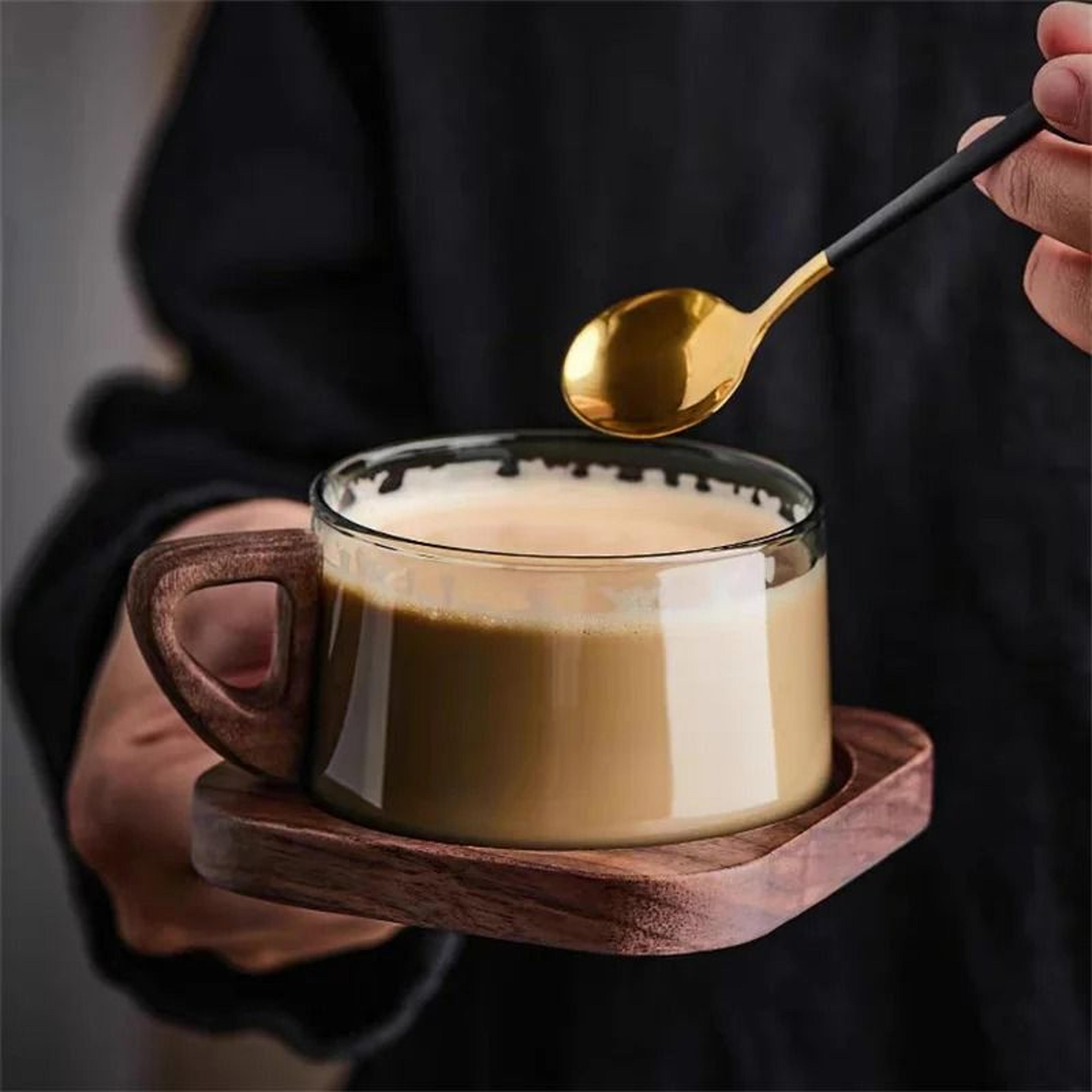 glass american latte coffee cup with wooden tray