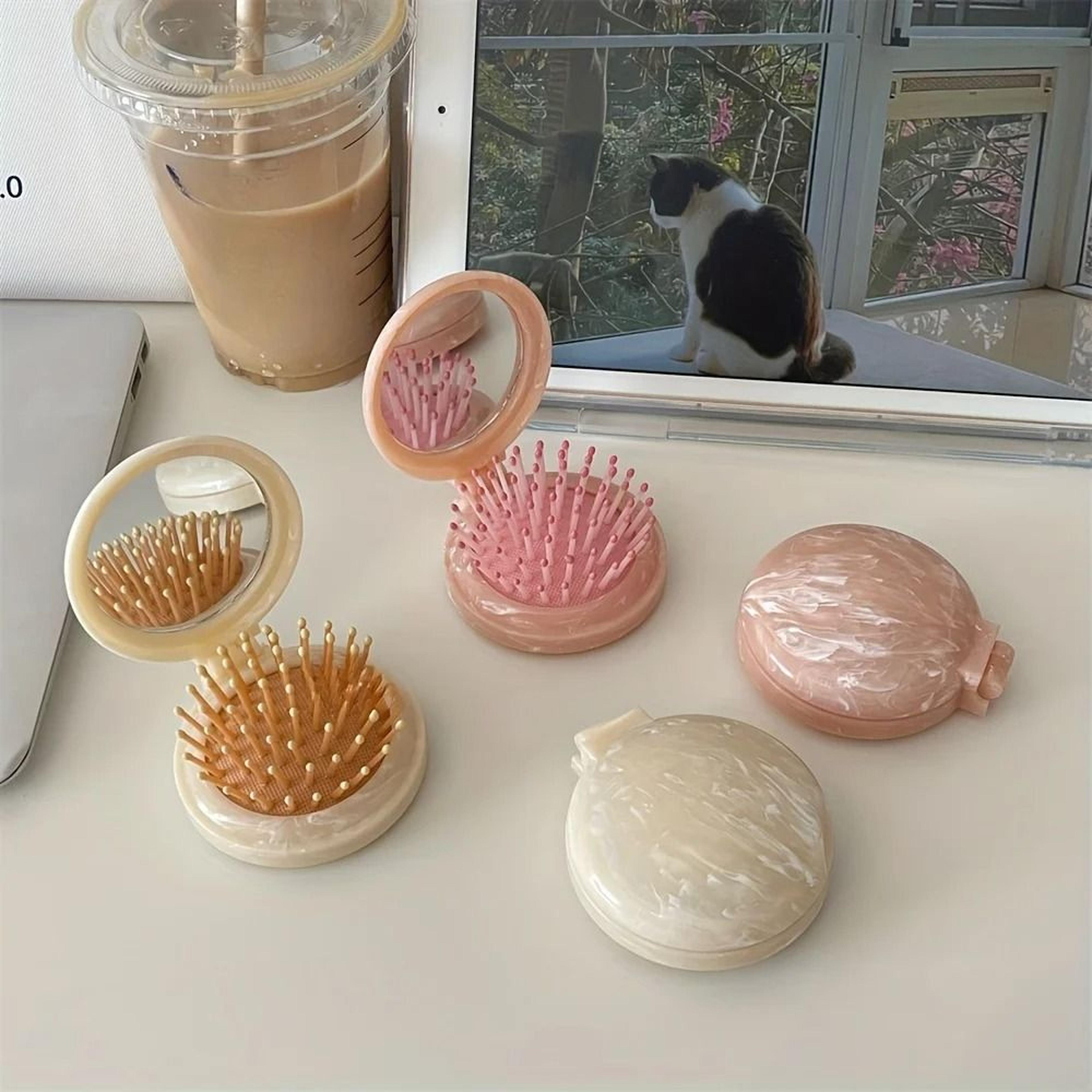 professional high stability marble patterned air cushion hair comb and integrated precision travel mirror