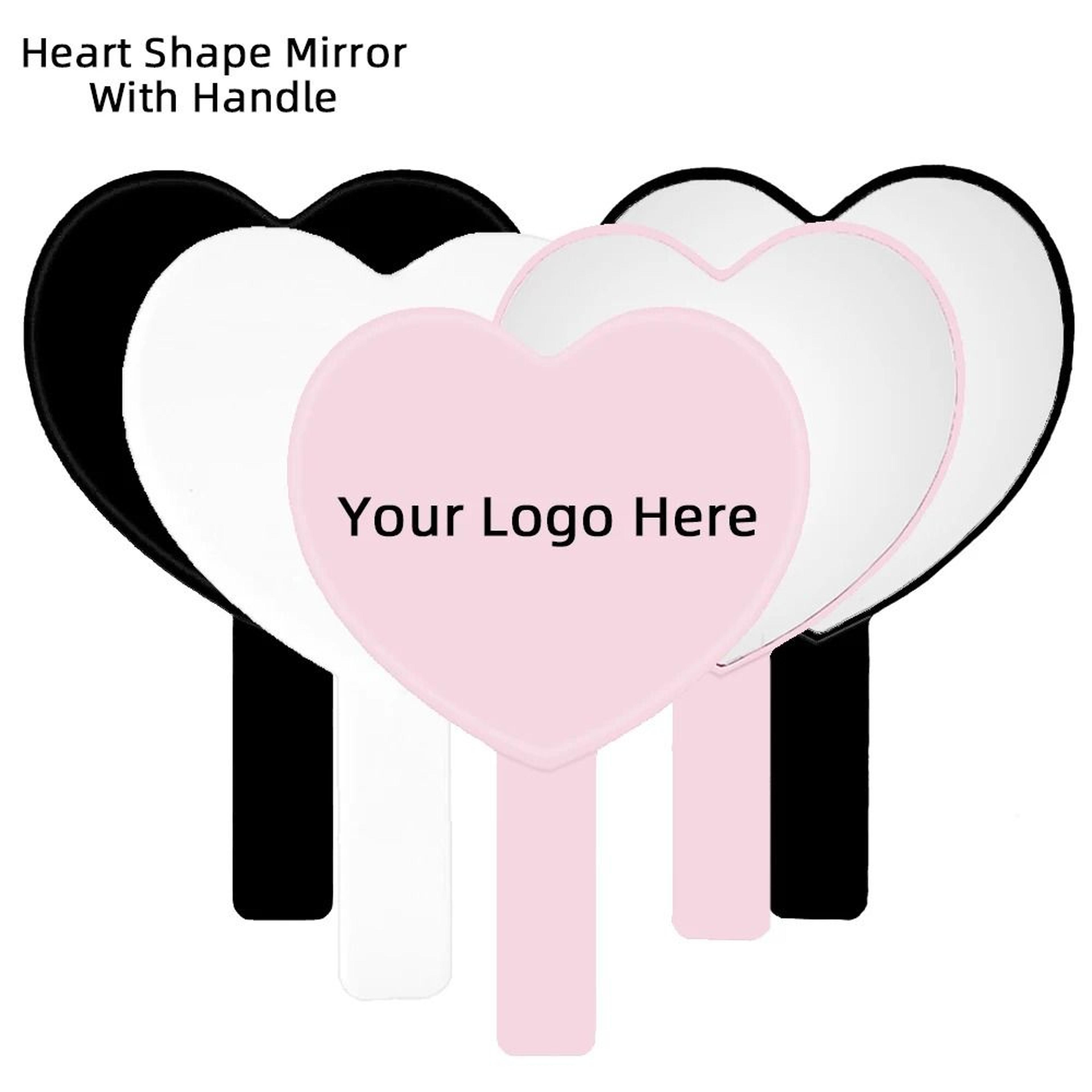 heart-shaped artist hand mirror
