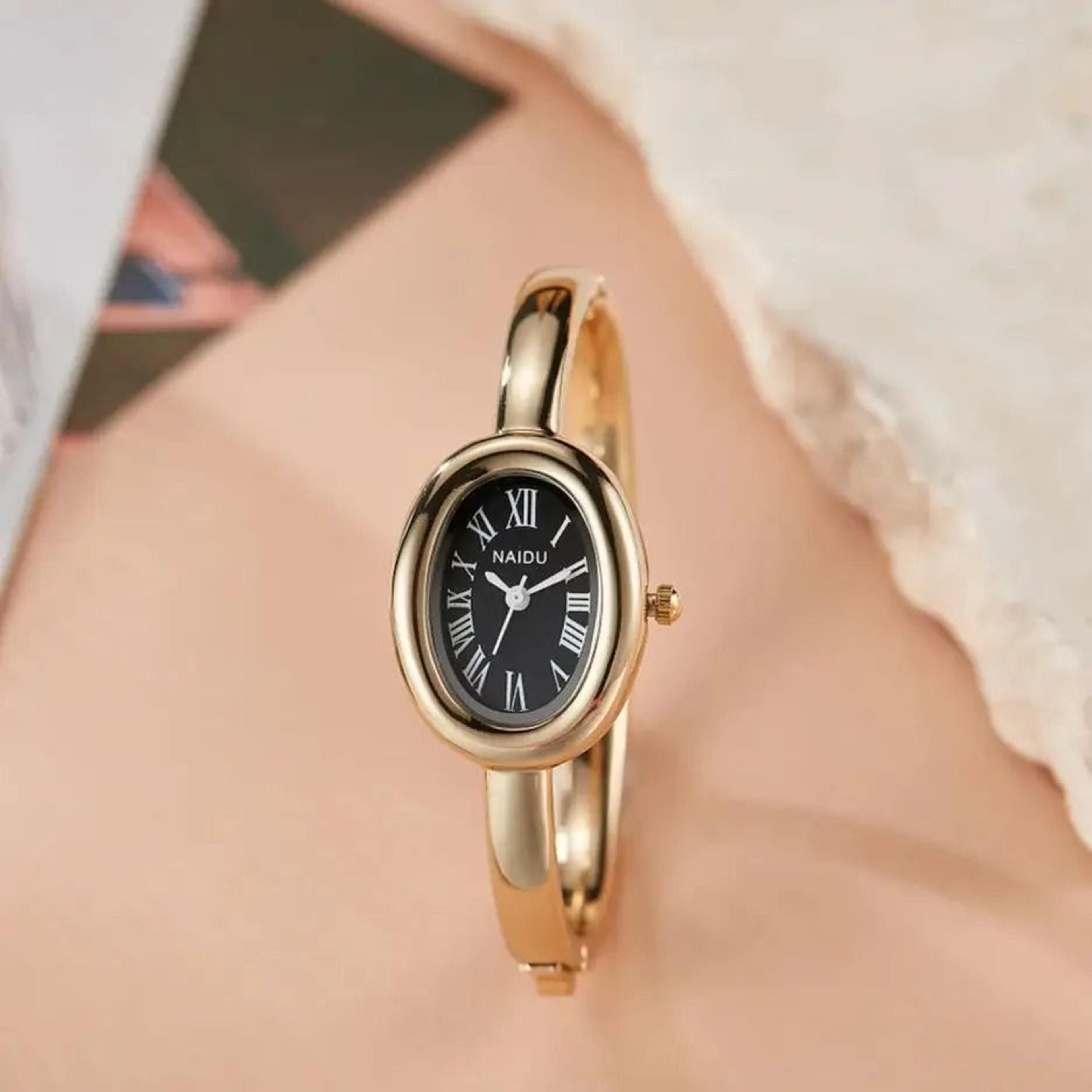 roman numeral oval bracelet watch – fashionable luxury waterproof quartz timepiece for women