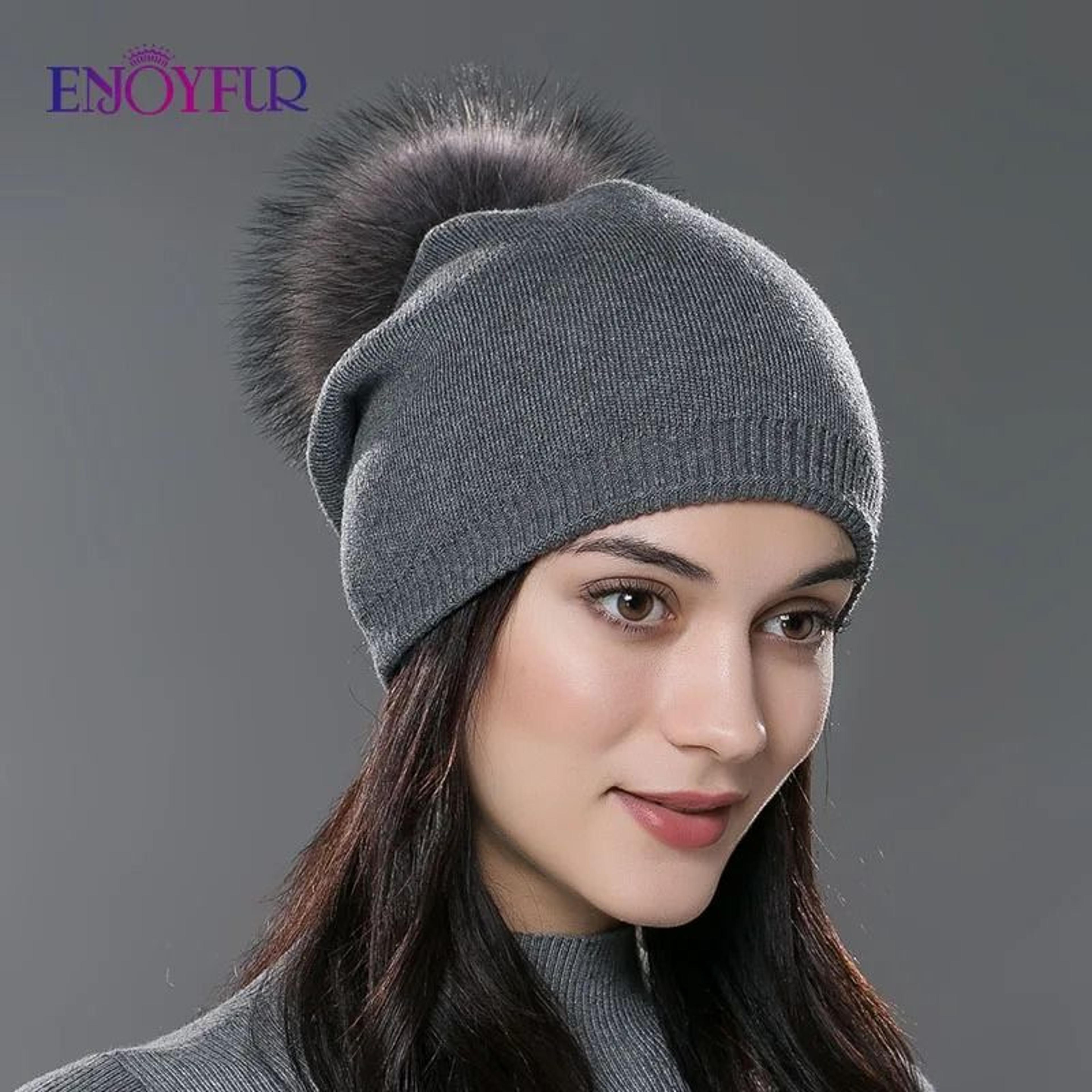 wool knit beanie with real fur pom pom