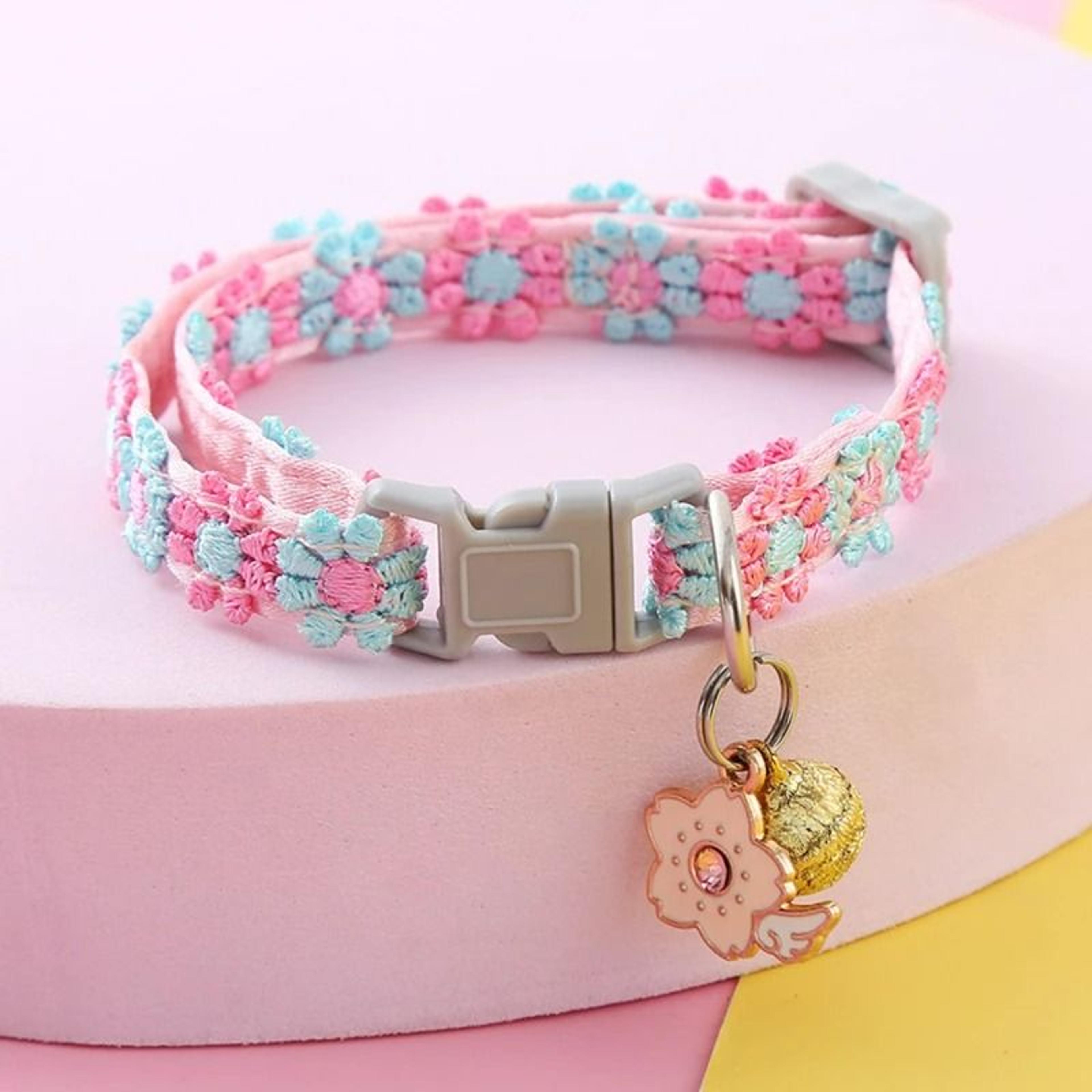 playful paw-print safety collar with jingle bell