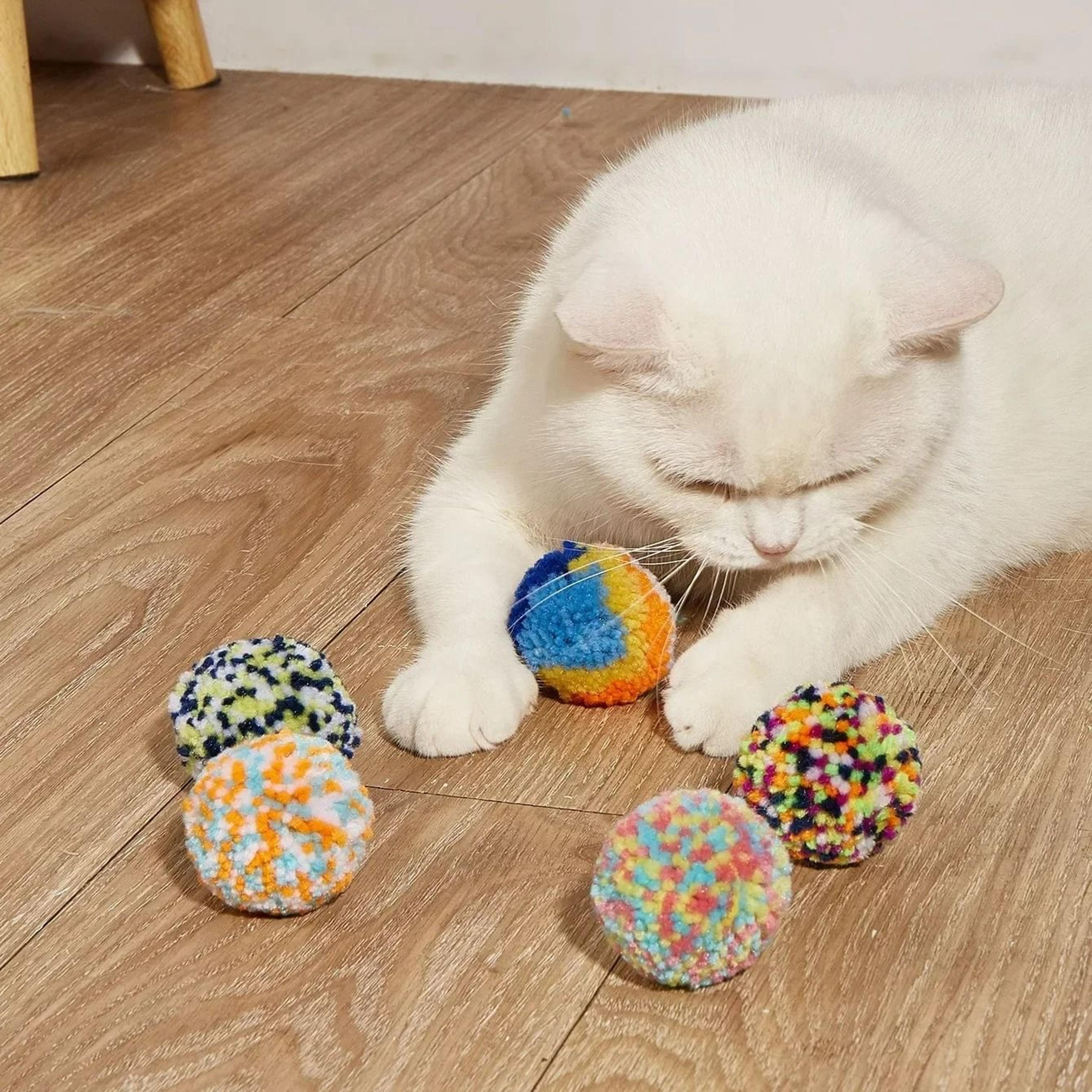 cozy yarn cartoon style playful cat ball