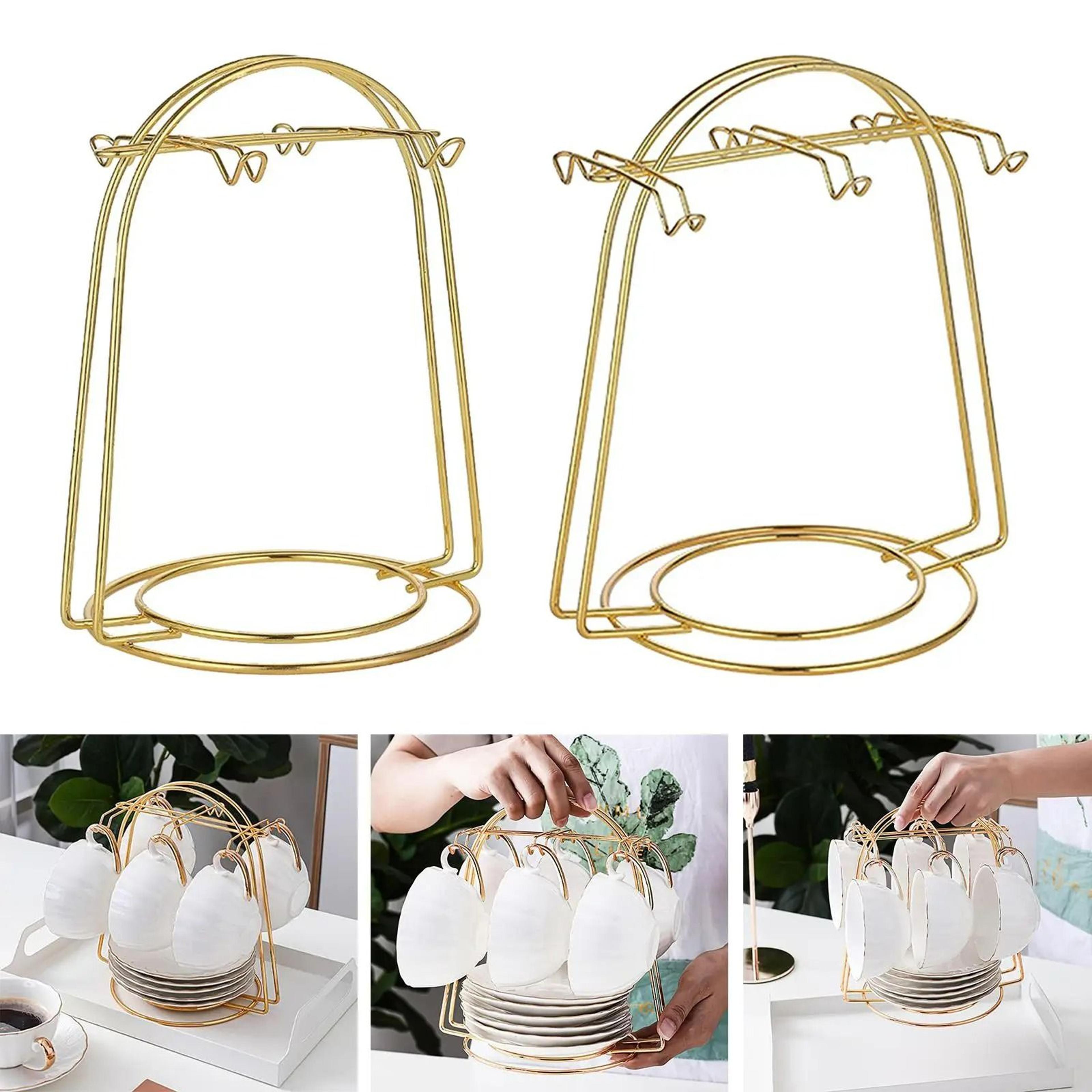 golden tea cup and saucer display rack