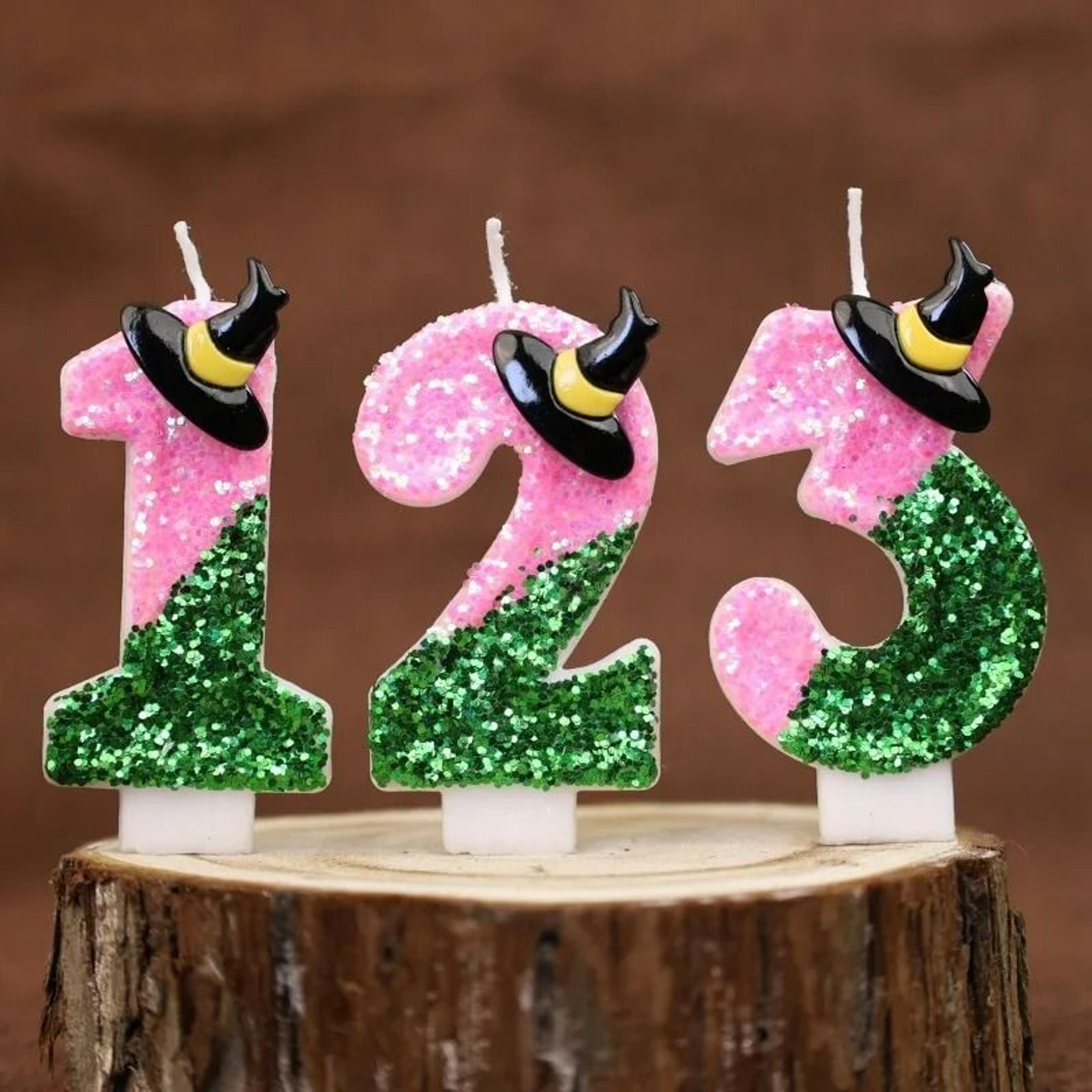 witch-themed pink & green number birthday candles for cakes