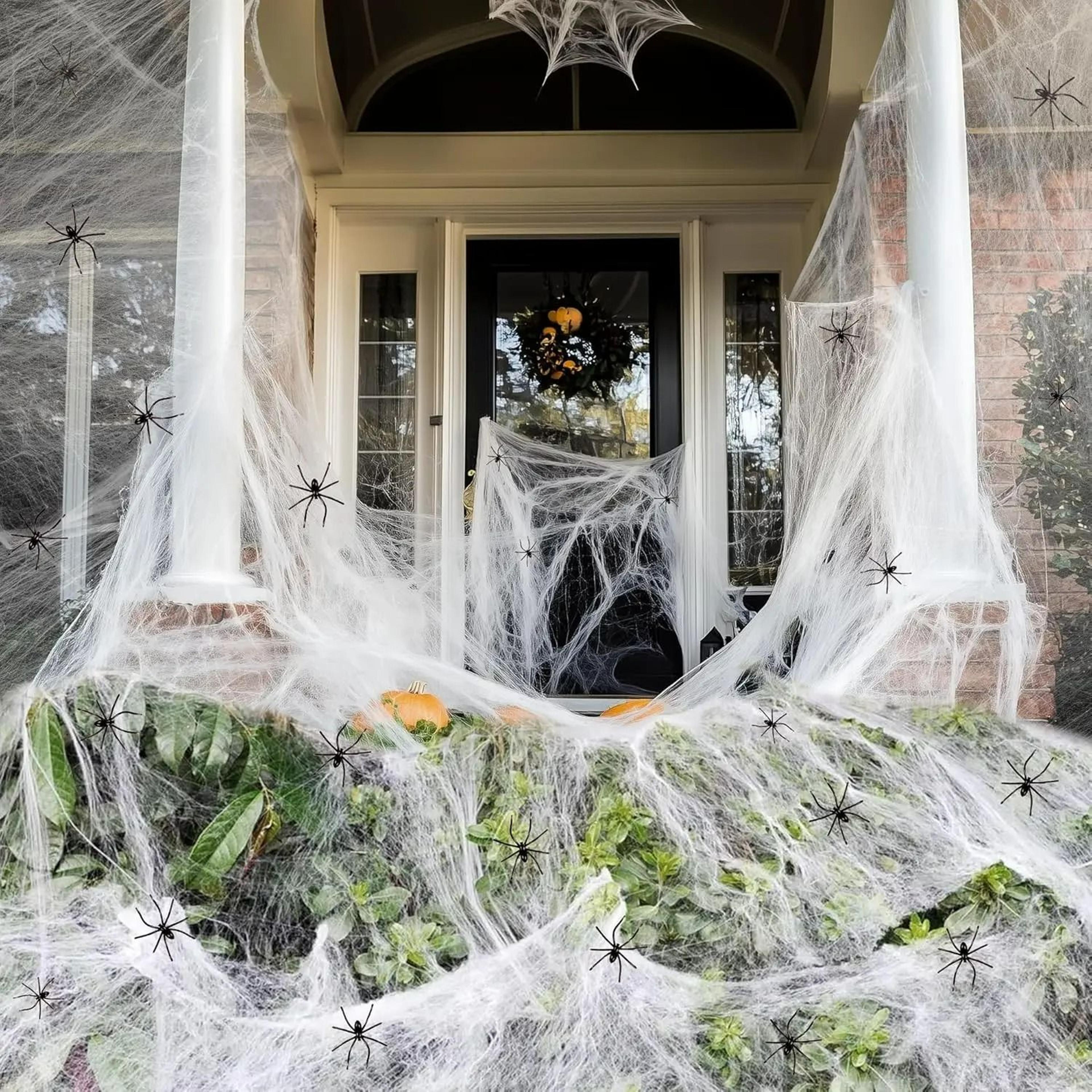 200 sq ft stretchable spider webs with fake spiders for halloween