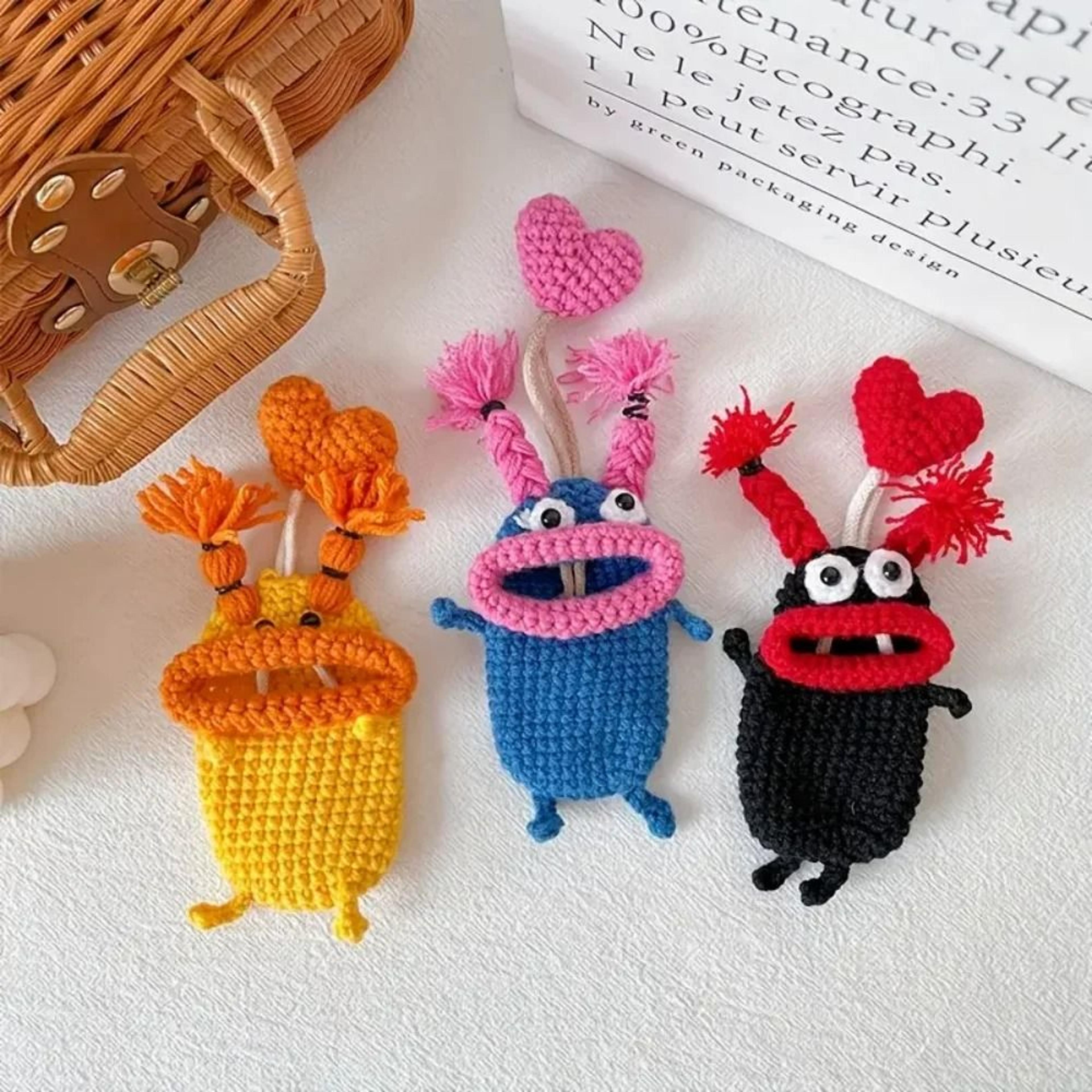 hand-woven fun big-lipped monster pull-out key case