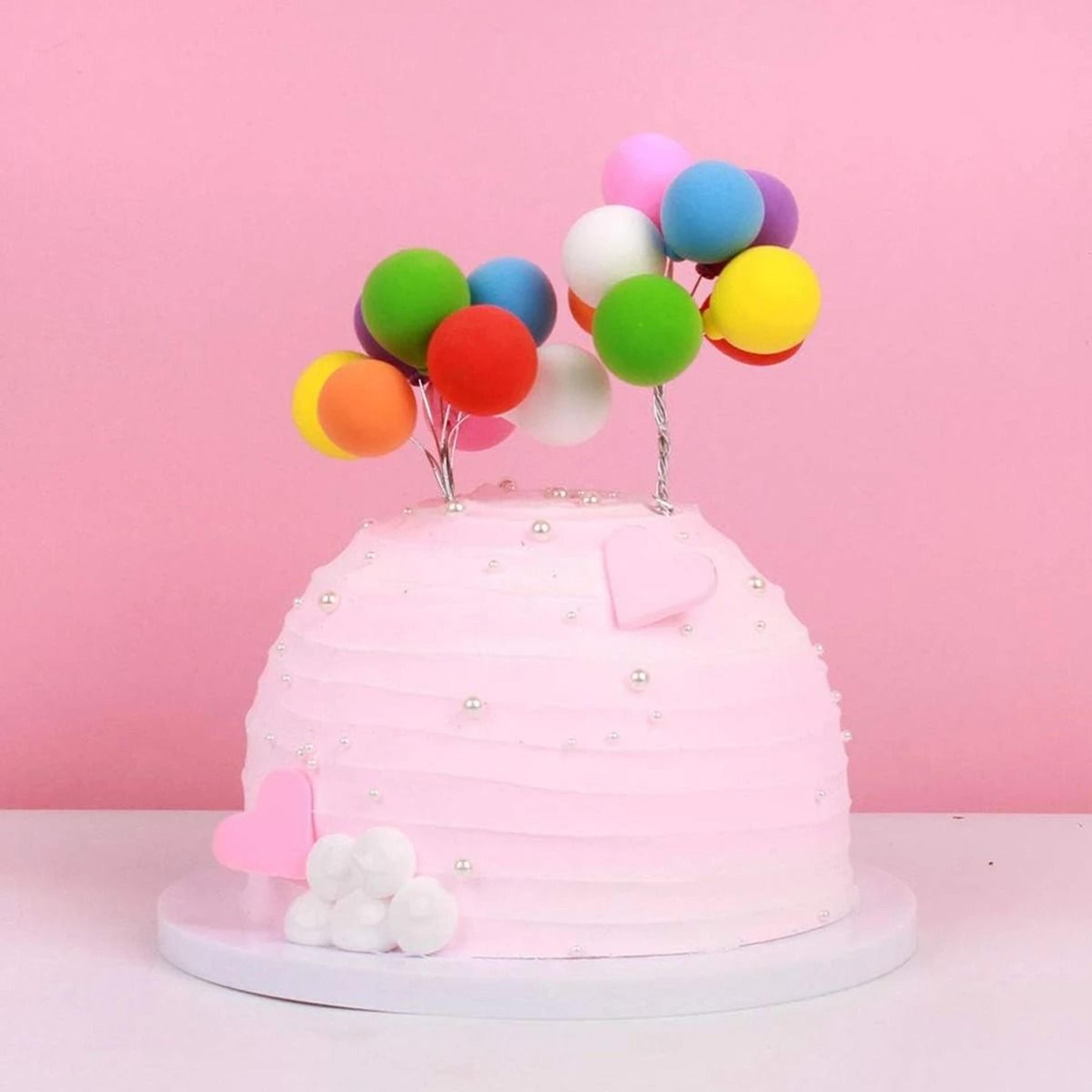 mini balloon cluster cake topper for birthday and wedding celebrations