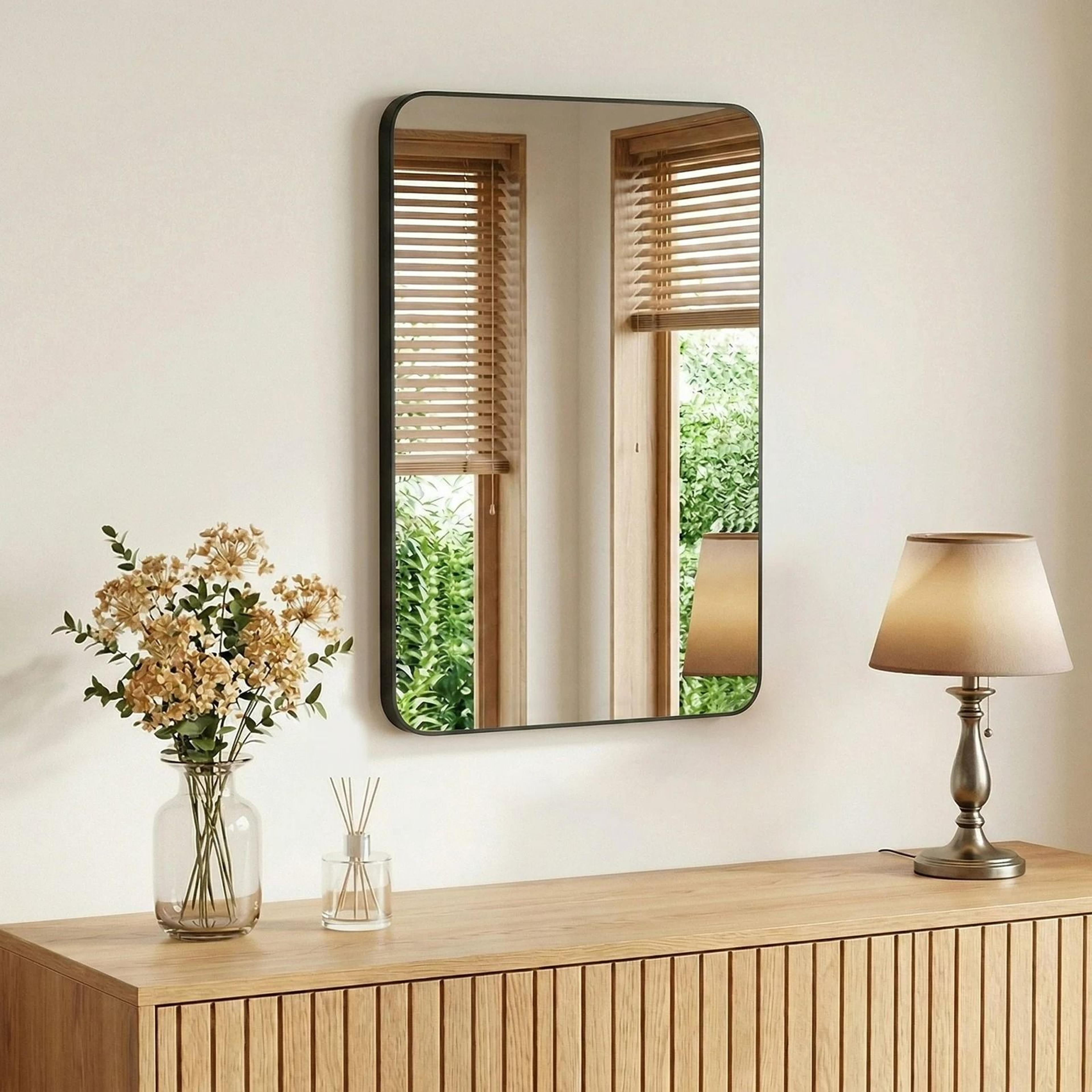 rounded rectangle metal framed wall mirror
