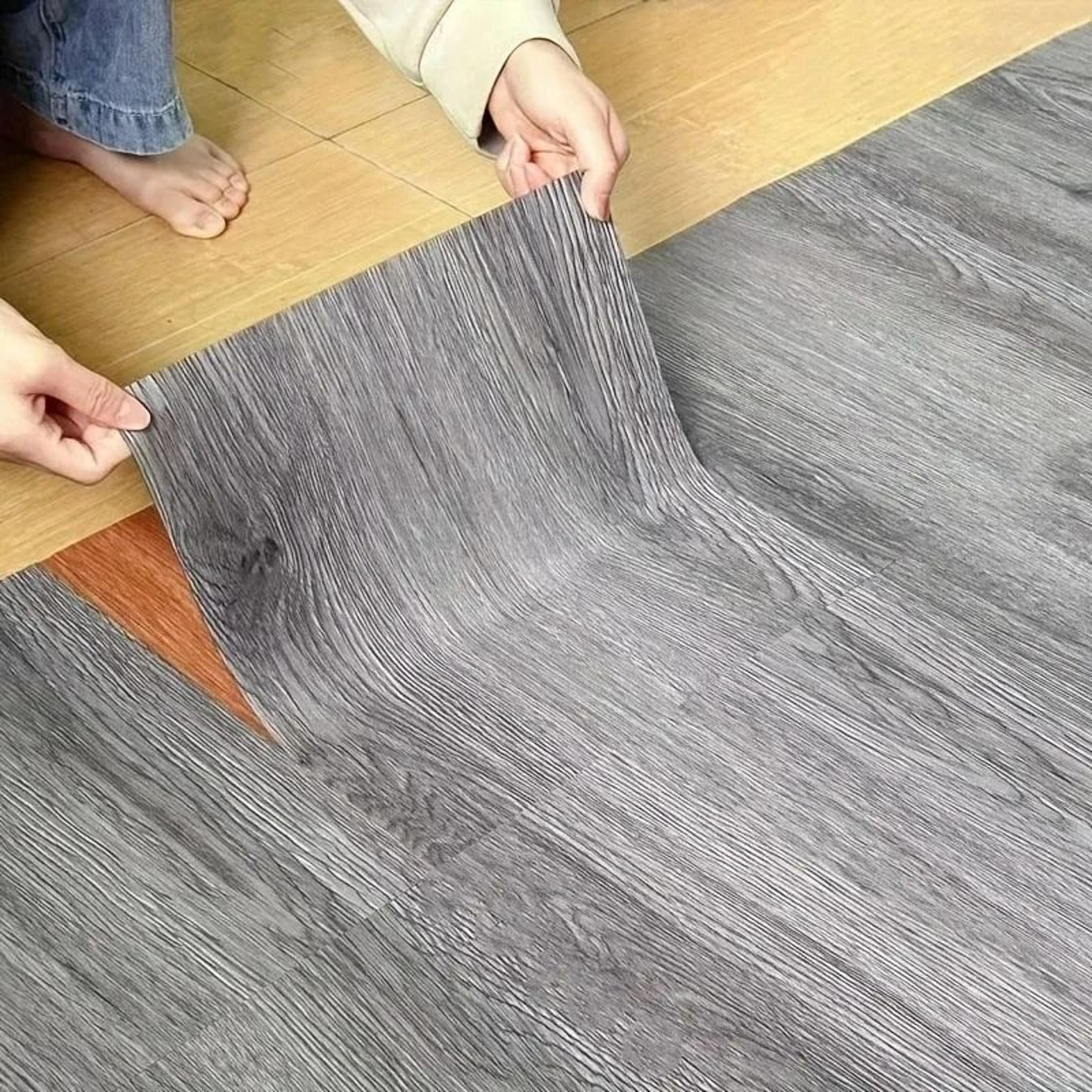 10-piece wood grain peel and stick vinyl plank flooring tiles
