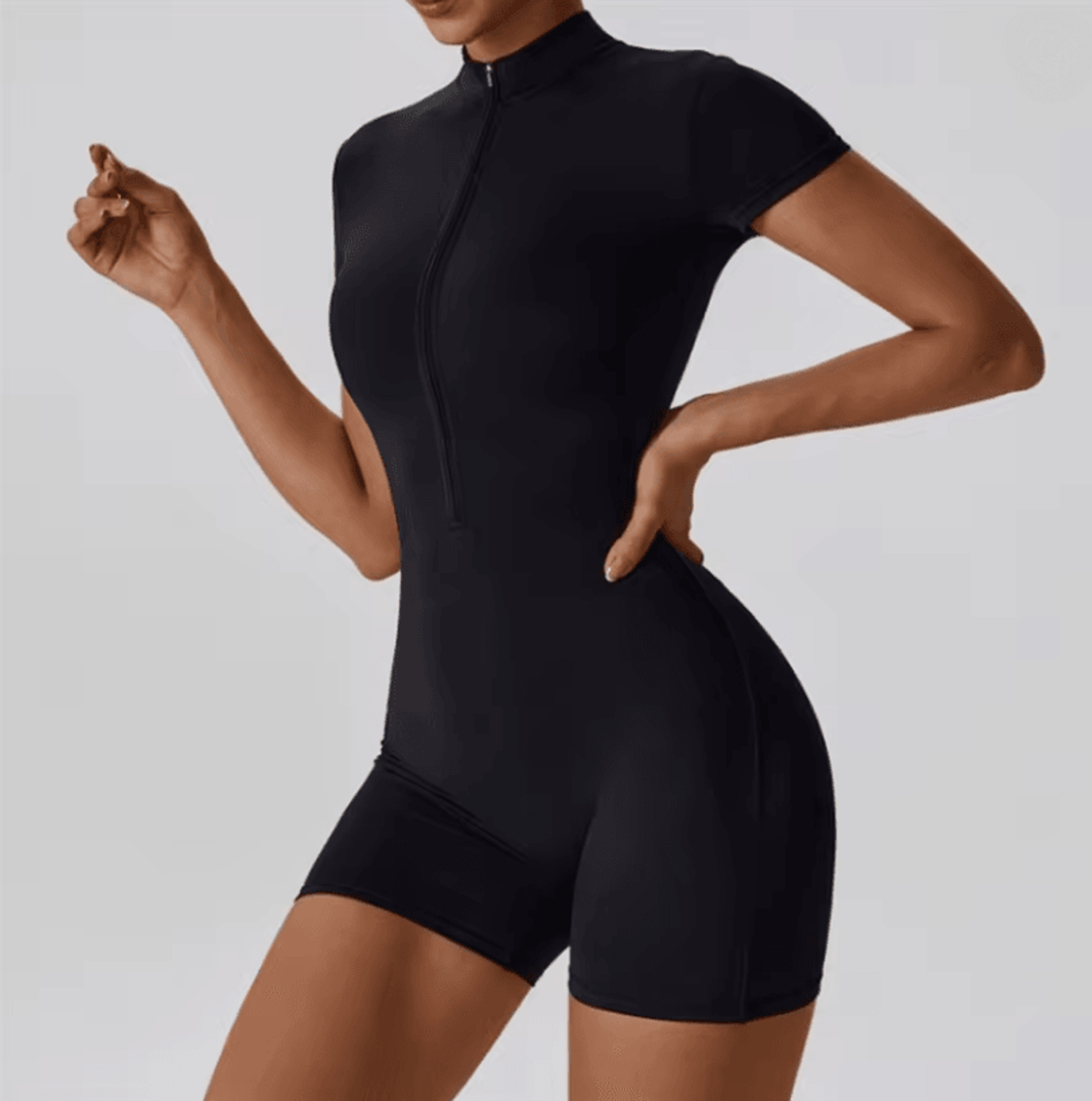 seamless one piece yoga jumpsuit with zipper and stand collar